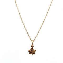 Collar colgante hoja de arce canadiense oro amarillo