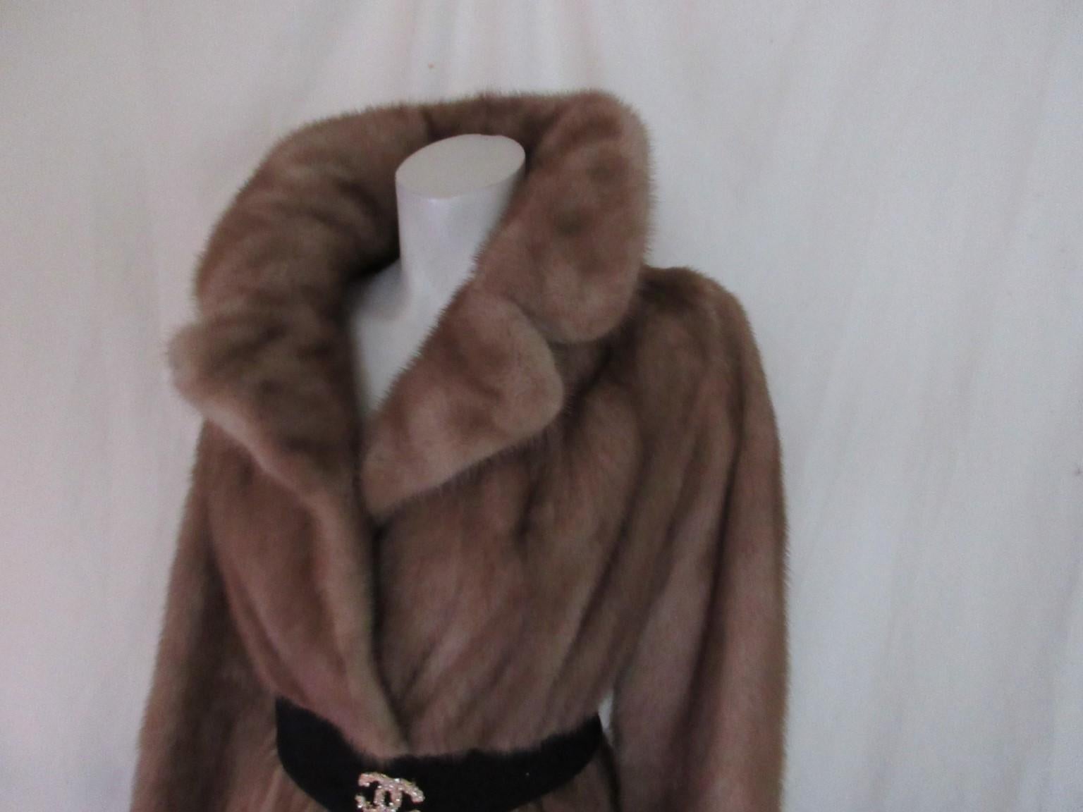 This exclusive vintage mink fur coat is made for Hudson Bay Company Furs, Canada
This color is rare to find.

We offer more exclusive fur and vintage items, view our frontstore

Details:
Color: hazelnut, blonde, brown
With 2 pockets, 3 closing hooks