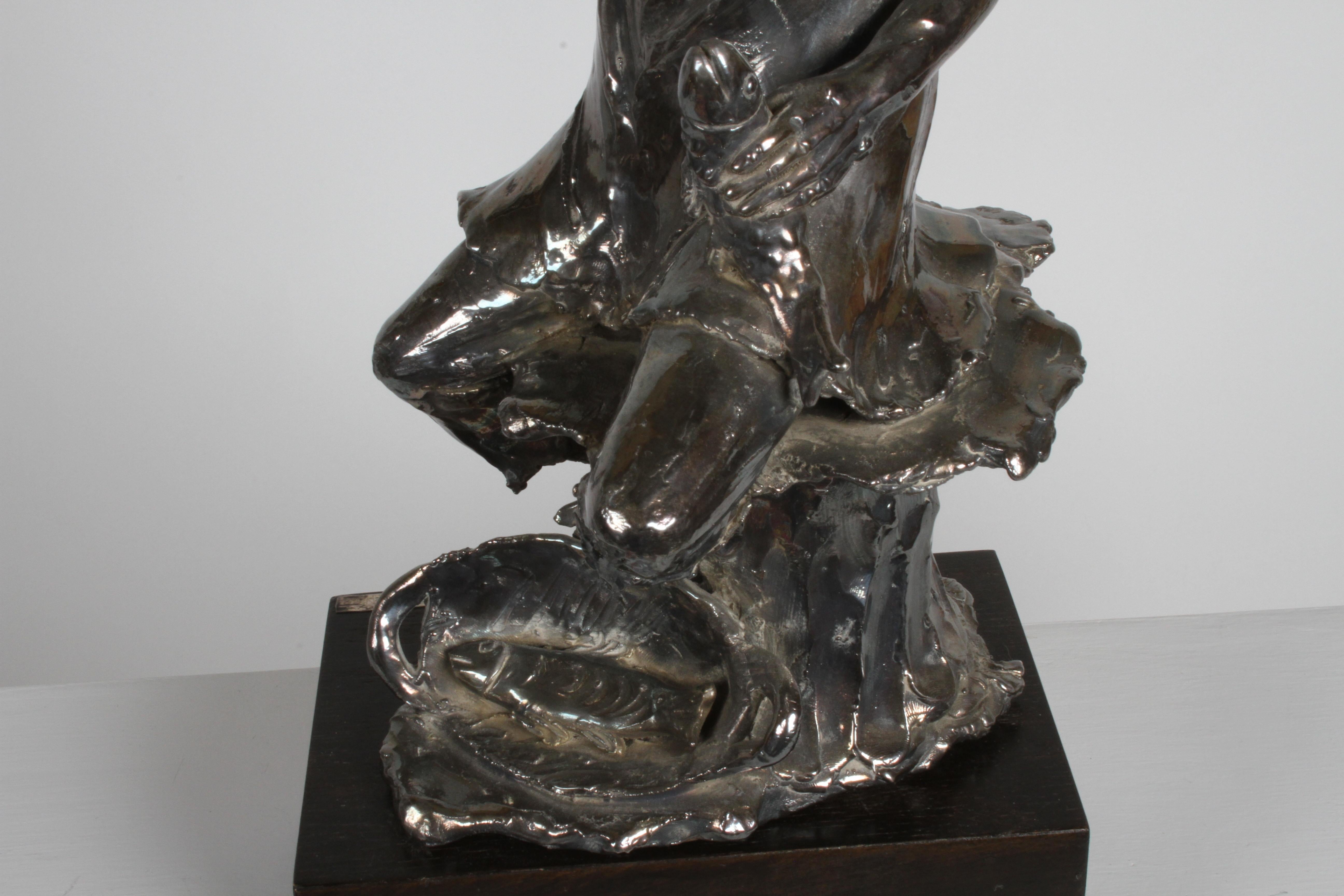 Mid-Century Modern Canadian Sculptor Alice Winant, Sterling Sculpture of a Fisherman on Wood Base For Sale