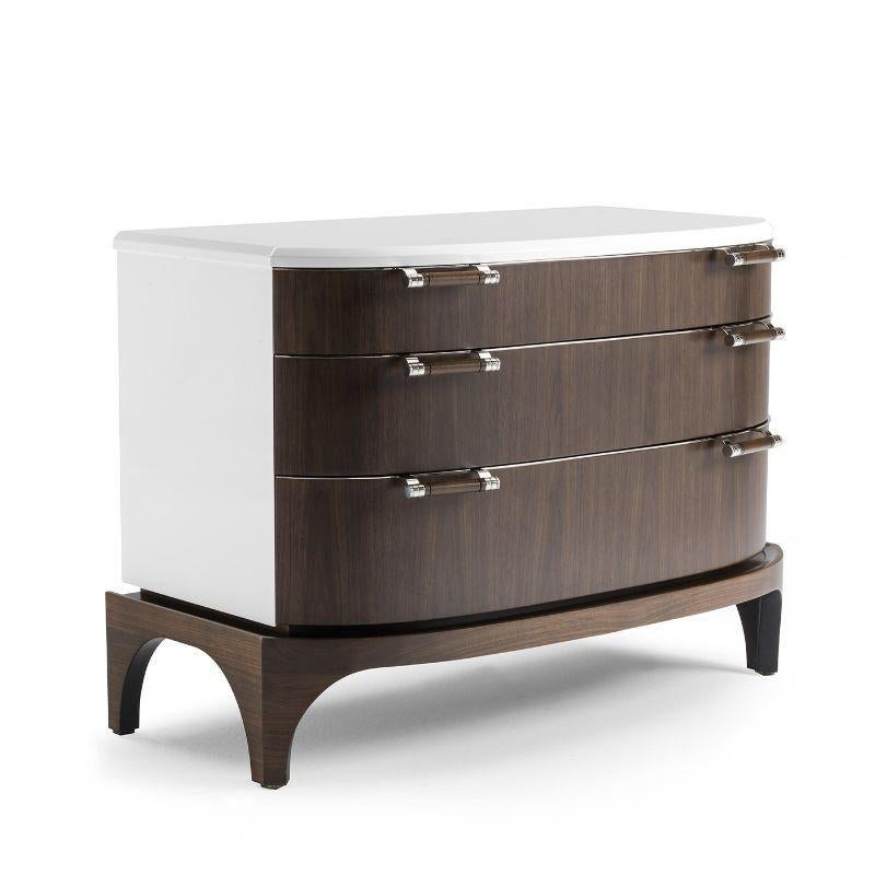 The perfect complement to the Canaletto Walnut Bedside Table, this gorgeous design features clean and rounded lines of utmost sophistication. Stately yet versatile, this dresser features a white-lacquered wooden top and is fashioned of Canaletto