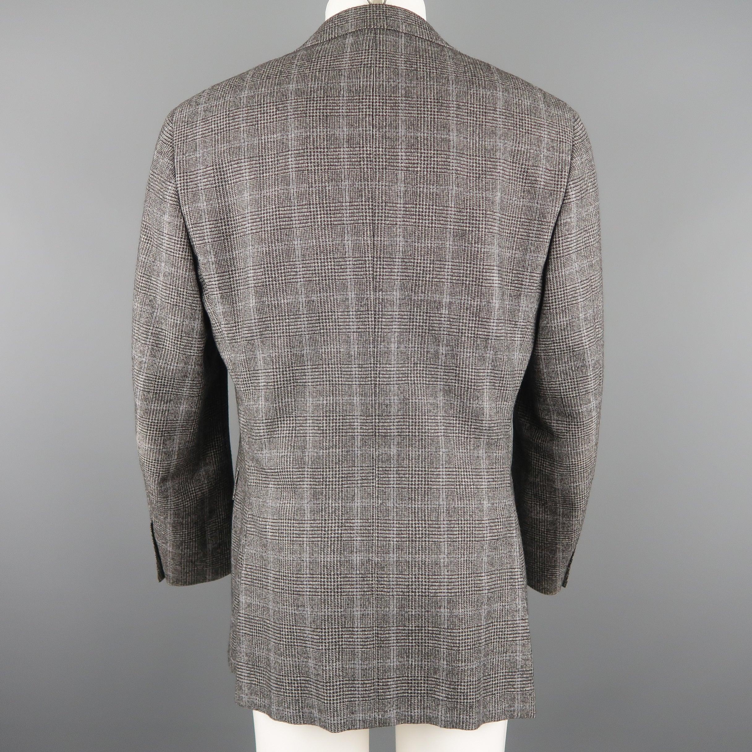 CANALI 
blazer comes in black and grey tones in a glenplaid wool / cotton material, featuring a notch lapel, slit and flap pockets, 2 buttons closure, single breasted. Made in Italy. Excellent Pre-Owned Condition. 

Marked:   50R IT 

Measurements:
