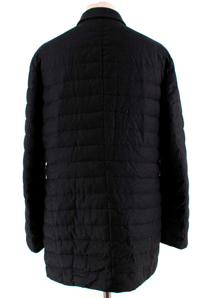 Canali Grey Quilted Down Long Jacket 

-Soft wool like texture 
-Lightweight warm padding 
-Neutral dark grey hue 
-Classic timeless cut 
-High quality feathers padding 
-Fabric treatment so that small drops do not pass through the surface 
-High