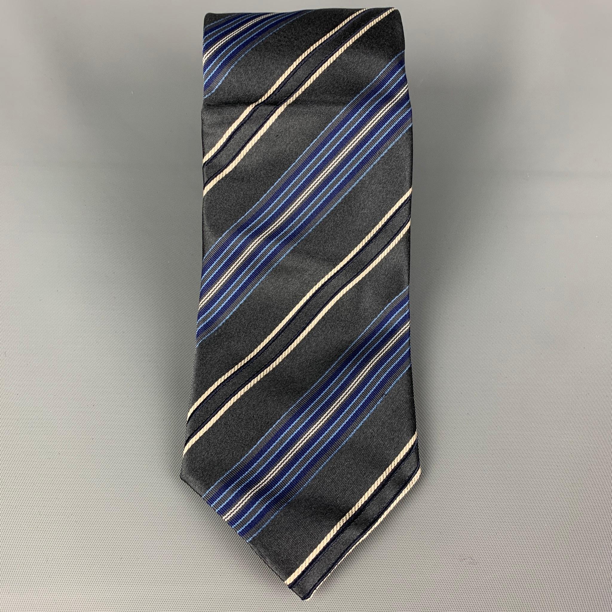 CANALI neck tie comes in a grey & blue diagonal stripe silk. Made in Italy. 

New With Tags. 
Original Retail Price: $150.00

Measurements:

Width: 3.25 in. 