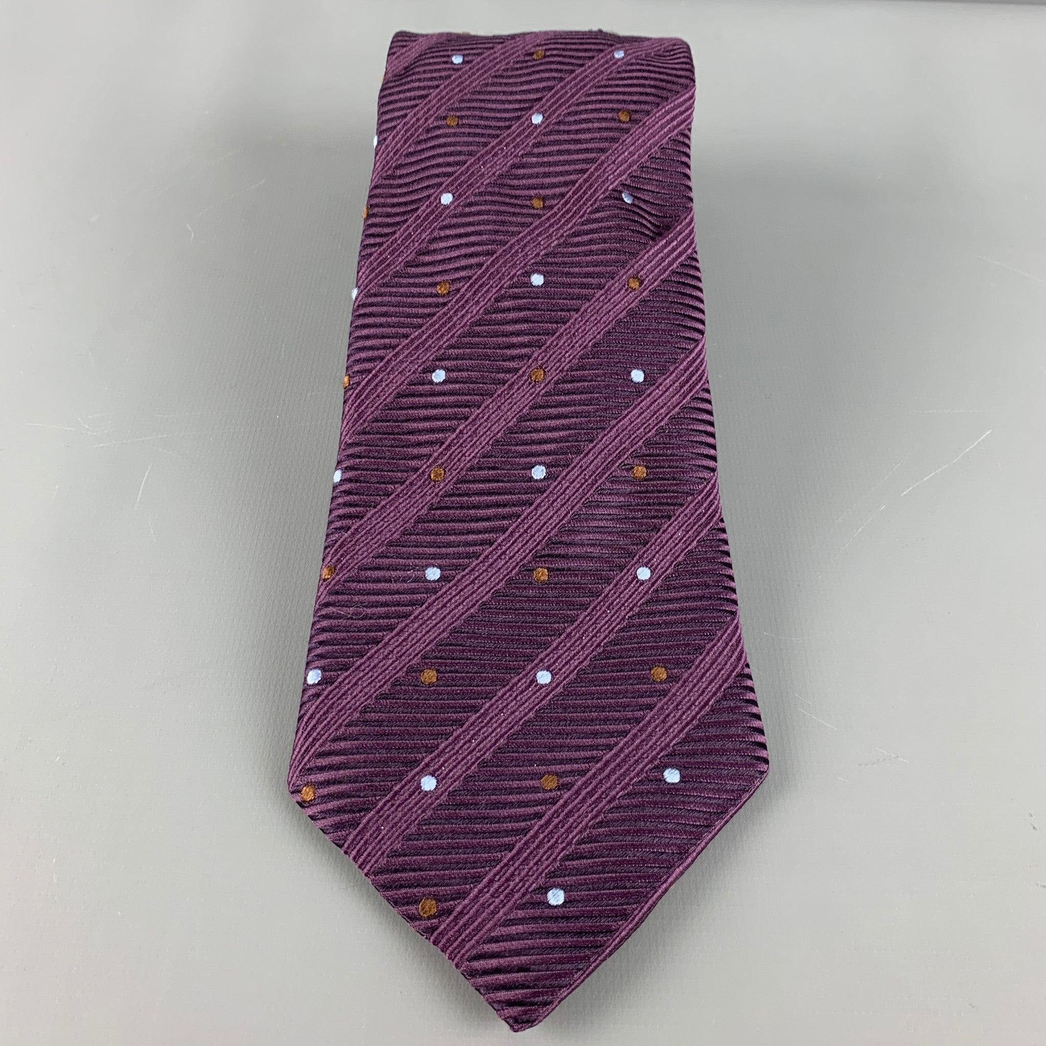 CANALI Krawatte aus 100% Seide, mit einem lila kontrastierenden Rippenmuster mit blauen und braunen Punkten. Made in Italy. sehr guter gebrauchter Zustand. 

Abmessungen: 
  Breite: 4 Zoll Länge: 60,5 Zoll 
  
  
 
Sui Generis-Referenz: