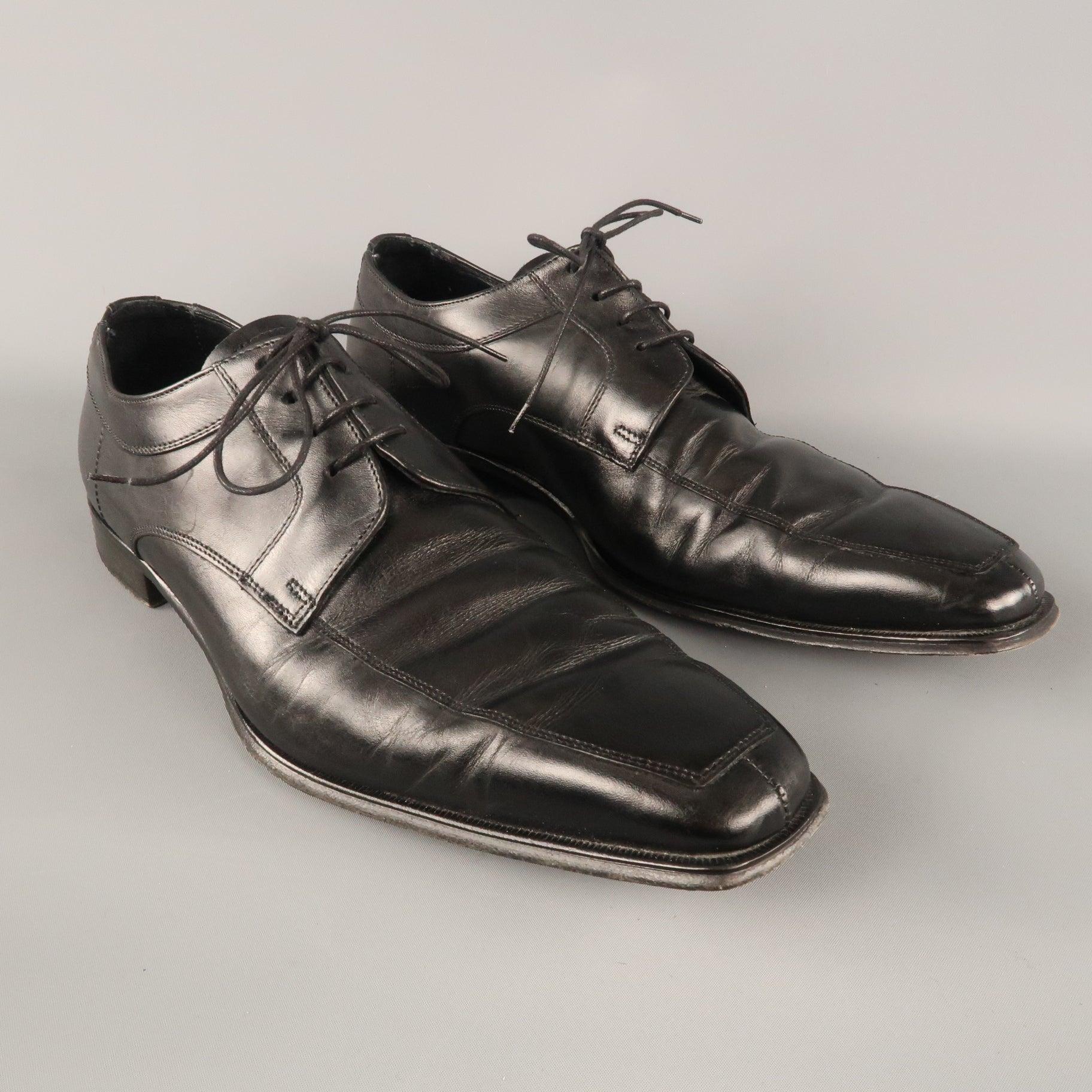 CANALI Lace up Shoes comes in a black tone in a solid leather material, with a heeled leather outsole. 
With Box. 
Made in Italy. 
Very Good Pre-Owned Condition.
 

Marked:   IT 46
l	Outsole: 13.5 x 4.5 inches  

  
  
  
 
Reference: