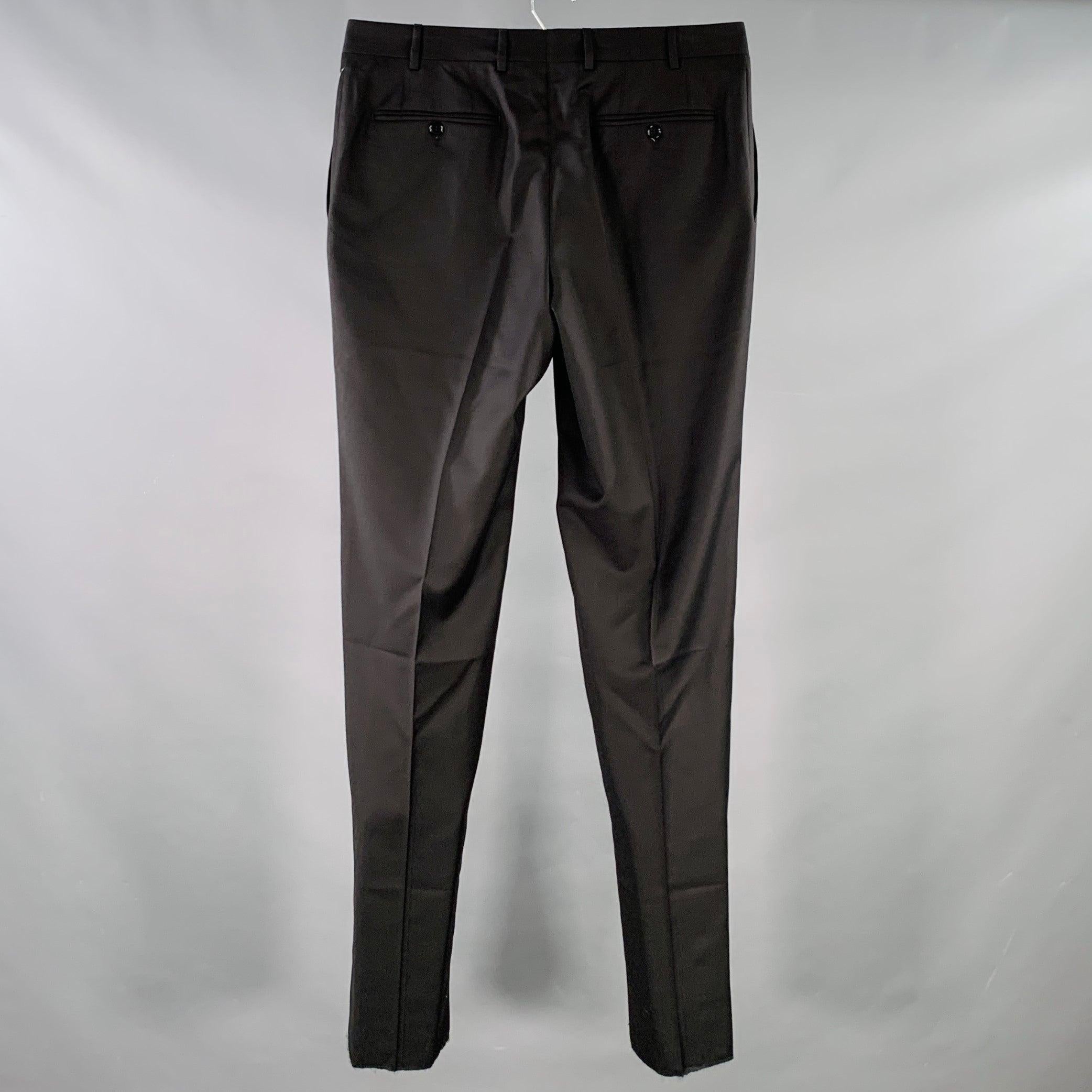CANALI dress pants
in a black wool featuring a flat front style, tapered leg, and zip fly closure. Hem has been left unfinished in order to tailor to your perfect fit. Made in Italy.New without Tags. 

Marked:   IT 50 

Measurements: 
  Waist: 34