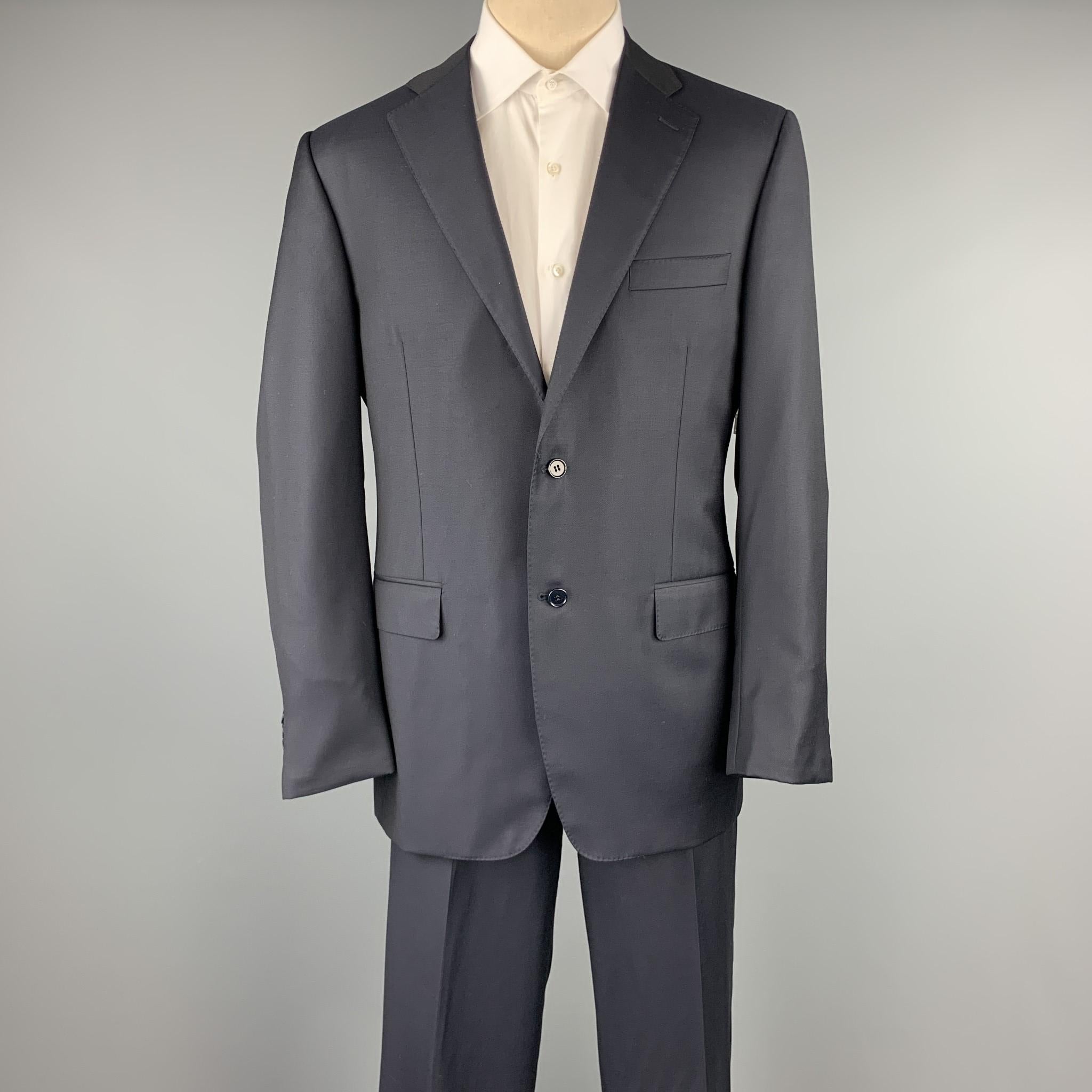 CANALI suit comes in a navy wool and includes a single breasted, two button sport coat with a notch lapel and matching flat front trousers. 

Excellent Pre-Owned Condition.
Marked: IT 52

Measurements:

-Jacket
Shoulder: 18.5 in.
Chest: 42 in.