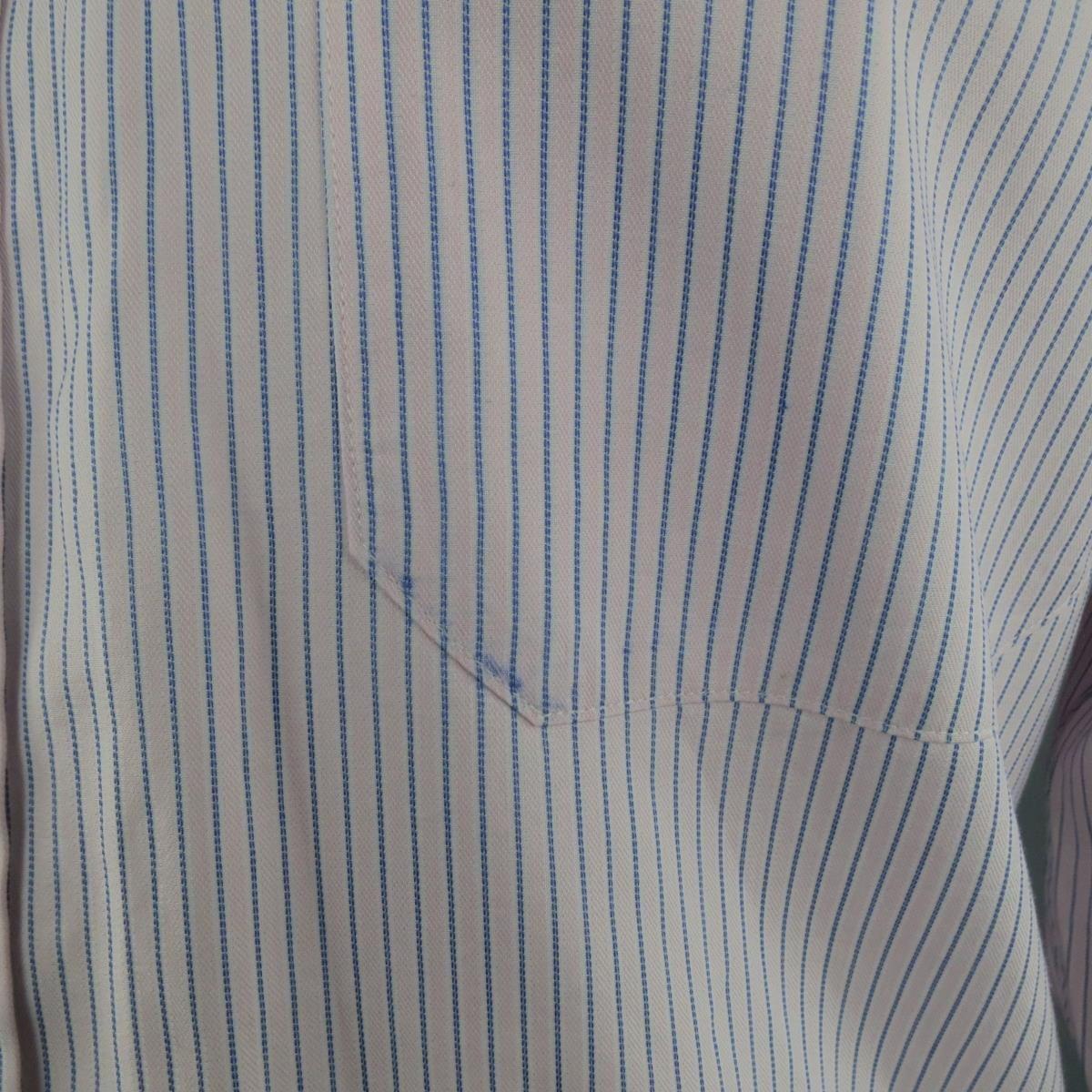 CANALI classic dress shirt in a light pink cotton with blue striped pattern with a patch breast pocket and pointed collar. Imperfection on pocket. As-Is. Made in Italy.
 
Good Pre-Owned Condition.
Marked: 41/16
 
Measurements:
 
Shoulder: 19.5