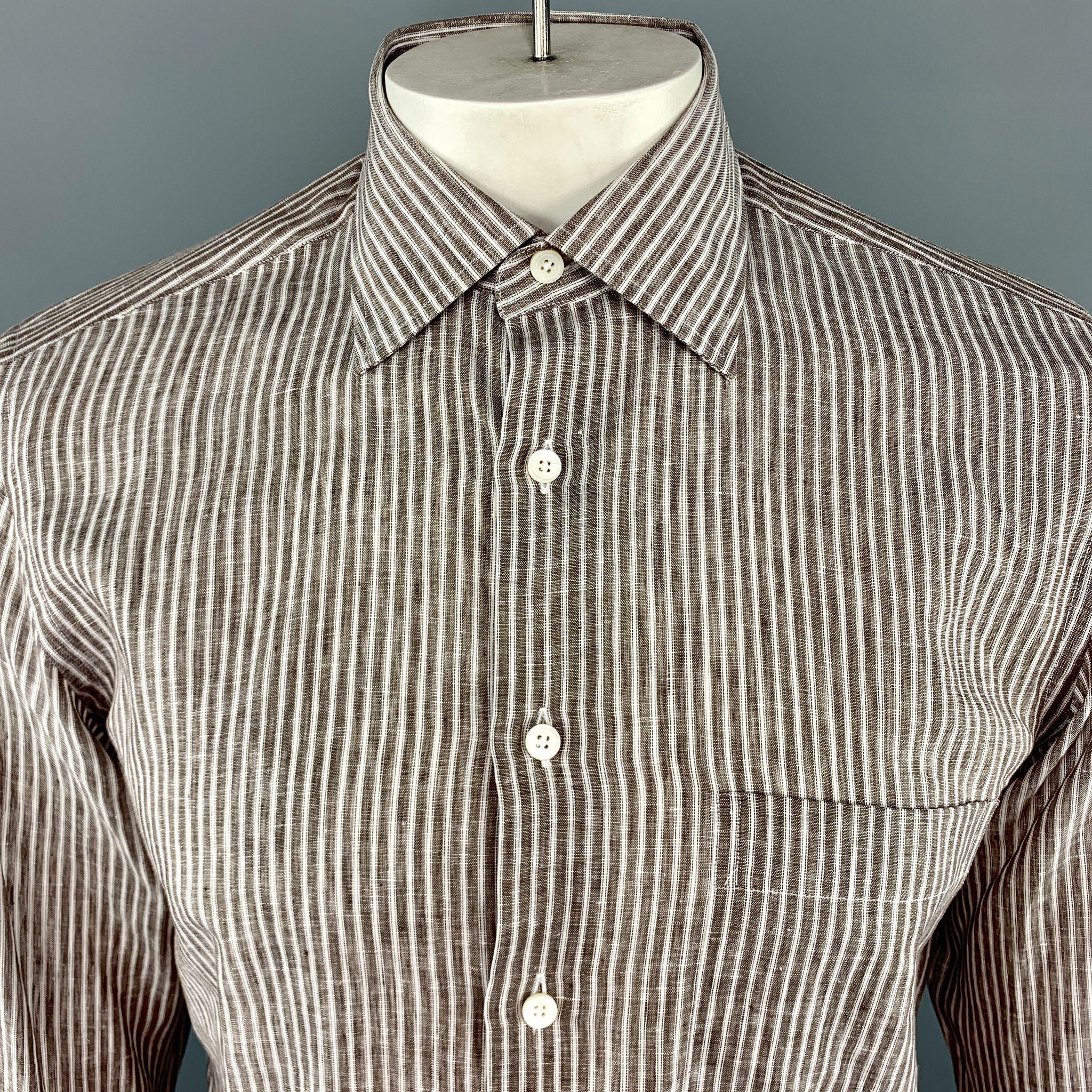 CANALI Long Sleeve Shirt comes in brown and white tones in a striped linen material, with a spread collar, a patch pocket, buttoned cuffs, button up. Made in Italy.

Excellent Pre-Owned Condition.
Marked: 39  15 1/2

Measurements:

Shoulder: 16.5