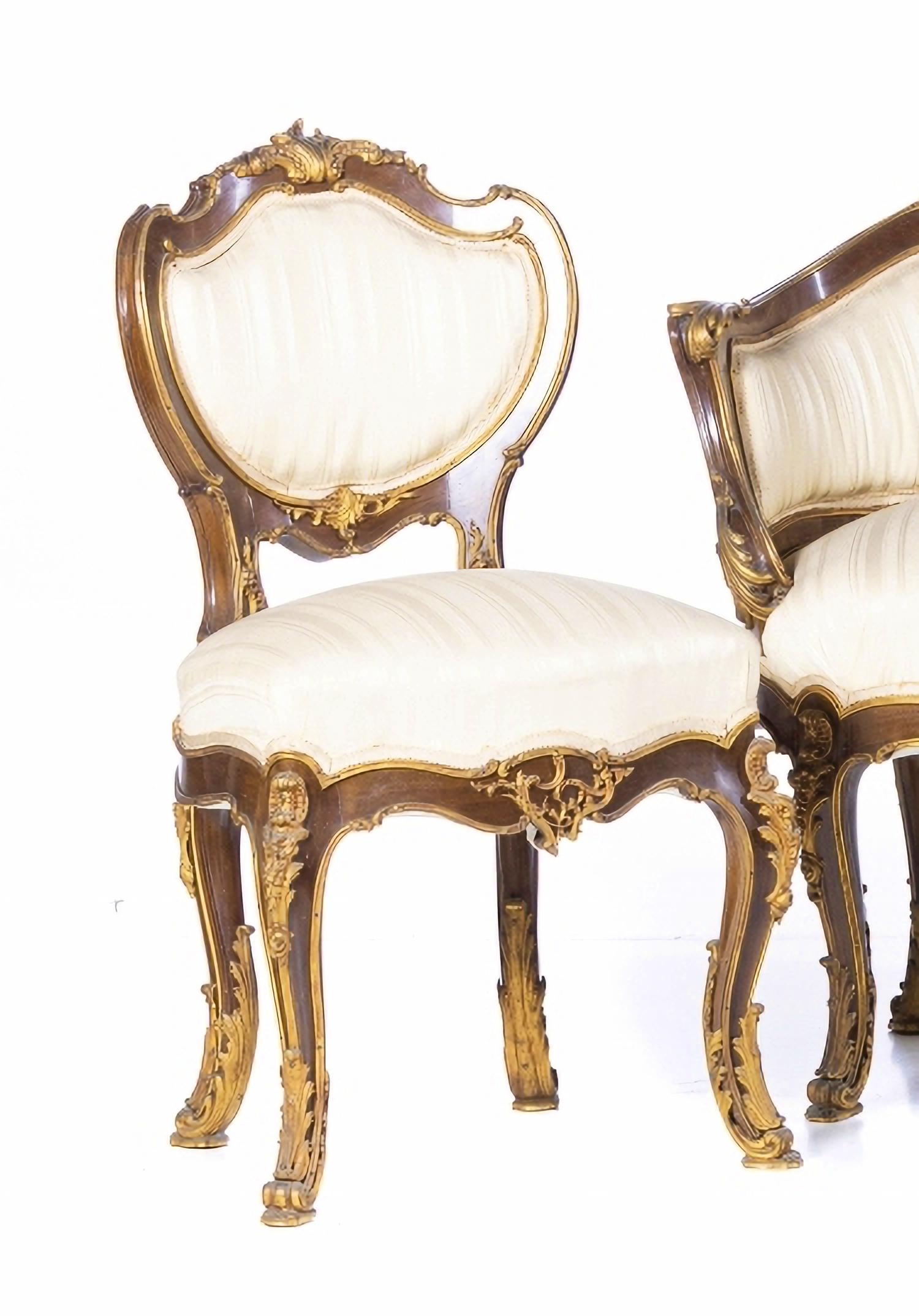 CANAPE AND PAIR OF LOUIS XV STYLE CHAIRS

French 19th Century
in mahogany wood with gilded and relief bronzes. Upholstered seats and back.
Dim.: (settee) 88 x 125 x 58 cm.
Good conditions.