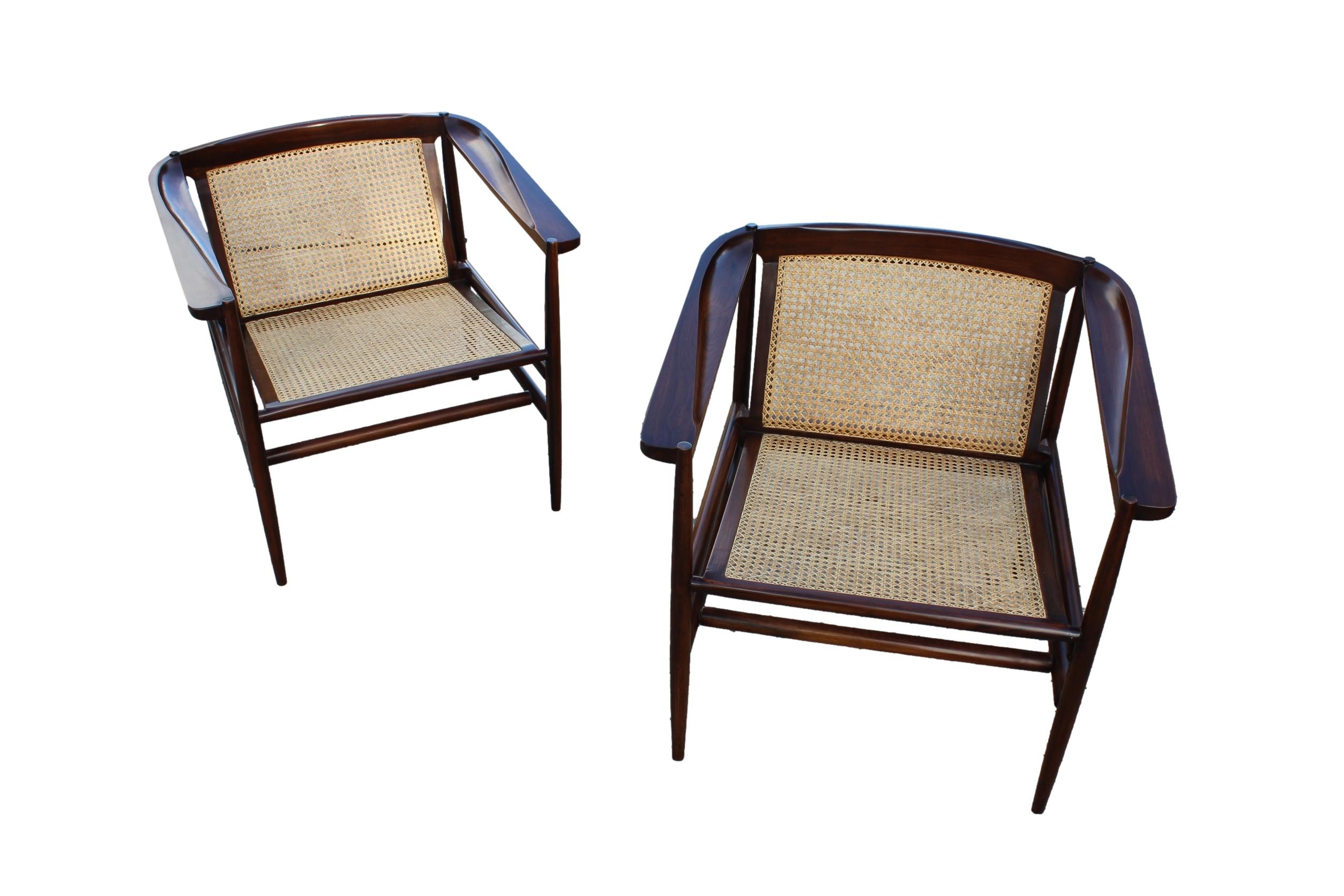 The iconic and timeless armchair designed attributed to Joaquim Tenreiro is now available with a beautiful cane.

It was restored and now it's ready to use.

P.S. Colors may vary.

This item does not display any labels.