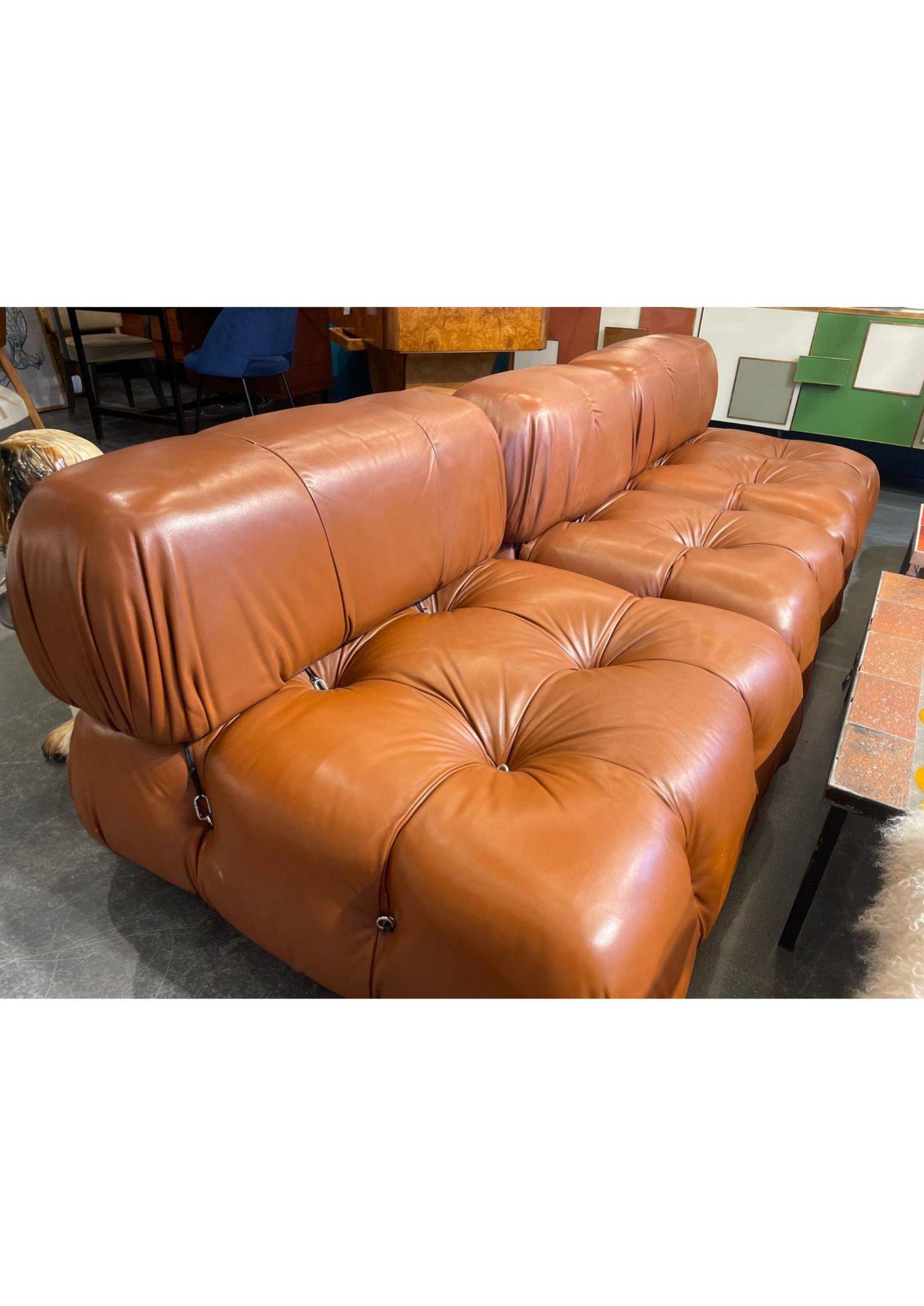 Stunning “Camaleonda” sofa by Italian designer Mario Bellini, made from polyurethane, leather, stainless steel carabiners, chrome-plated brass rings, and solid beech wood legs.