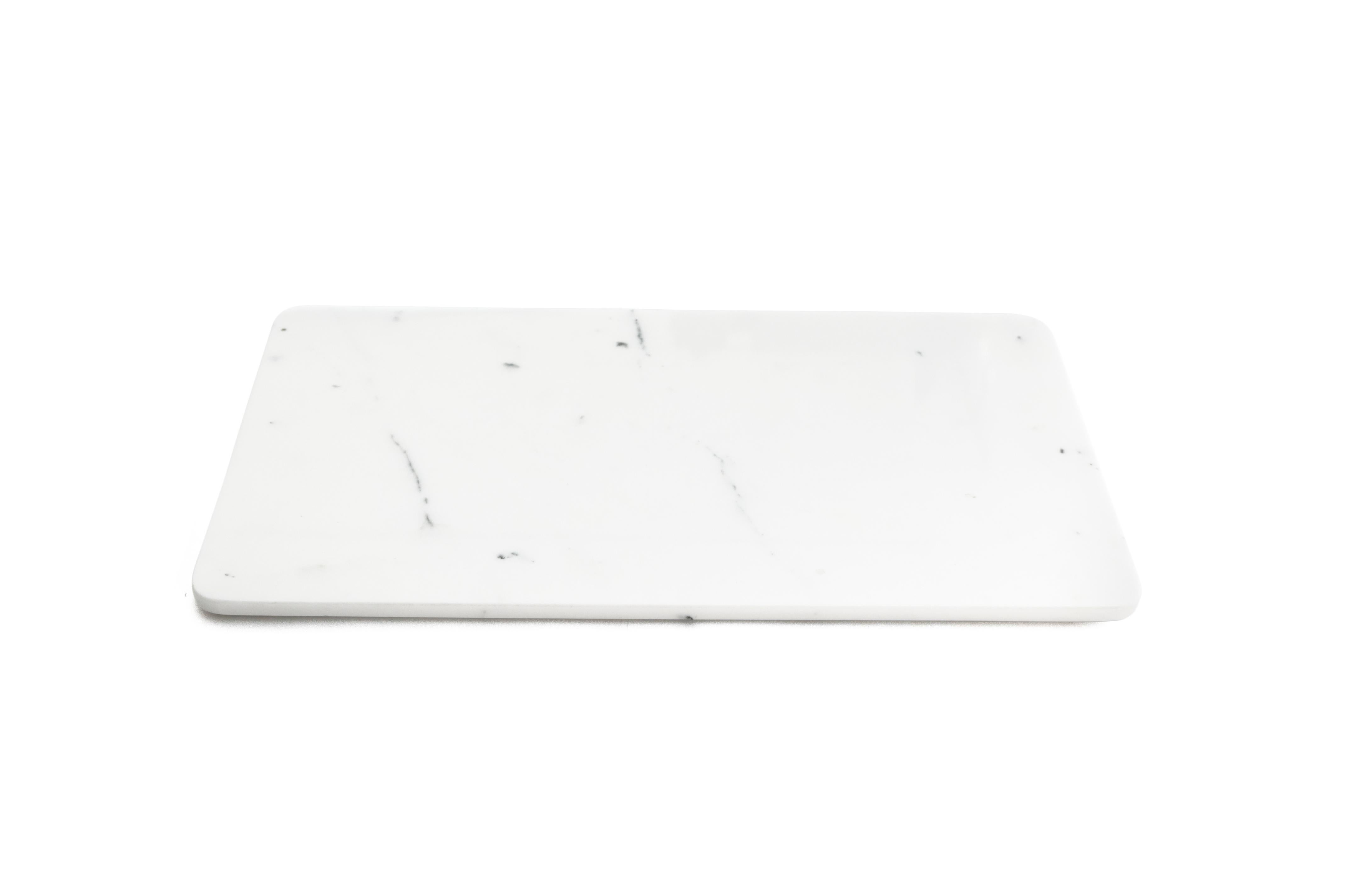 Canapè, cheese plate, sushi plate, serving dish in white Carrara polished marble.

Ideal for spa, hotel, restaurant and to serve food in a very sophisticate plate in your house. It can be used also as a nice display of sweets and chocolates.
Each