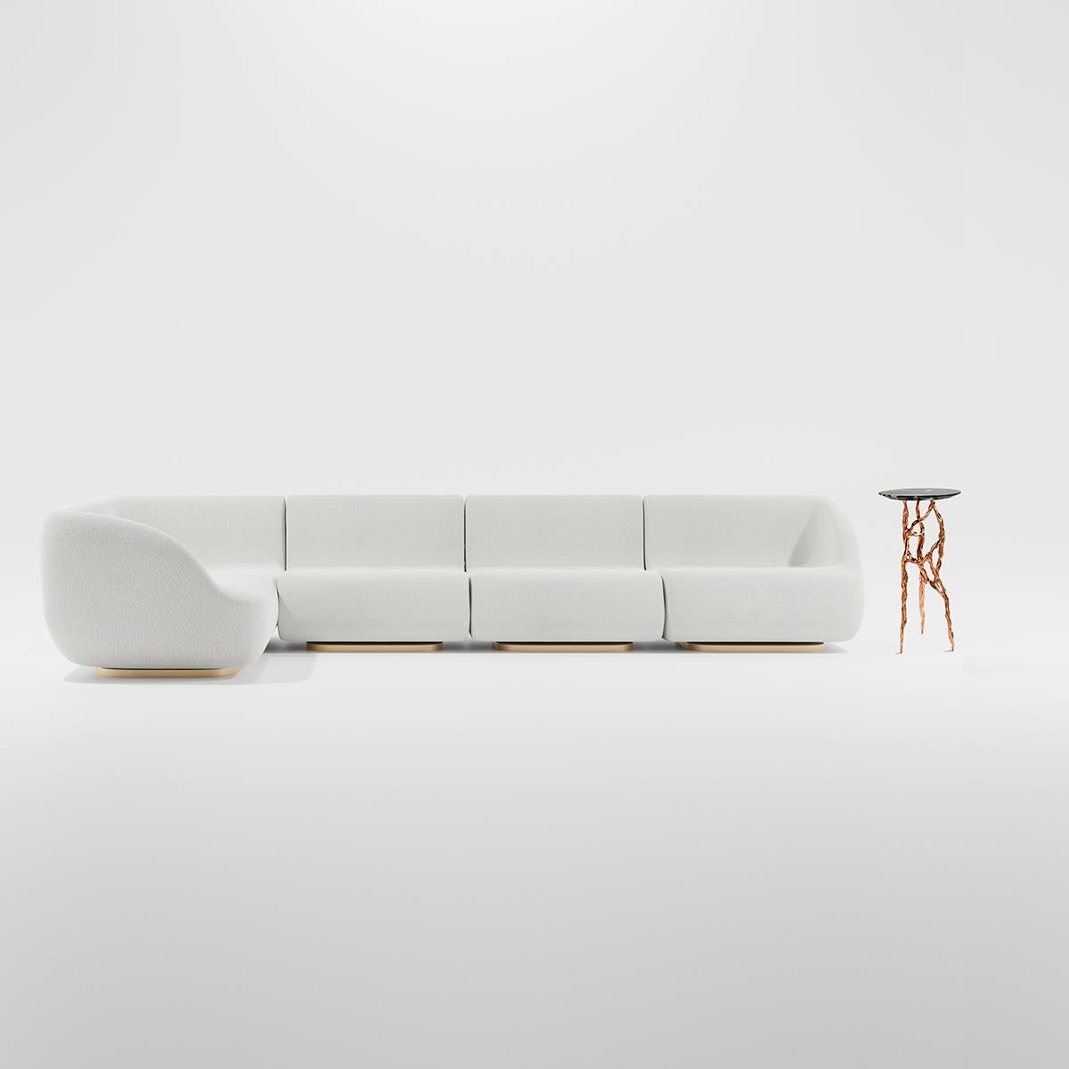 Four primary elements, each with an independent hand patinated brass base, combine to create a Classic L shaped design. The side element detaches and functions as an meridian chaise lounge. Alternative configurations - u and straight, as well as