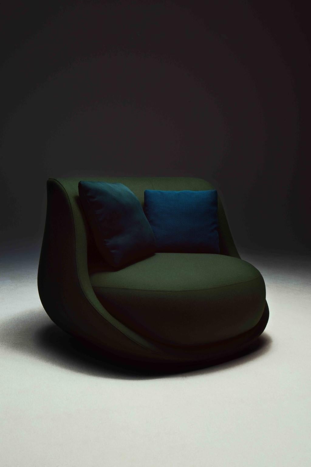 Canapé sofa by Luca Nichetto 
Dimensions: W 175 x D 106 x H 77
Materials: fabric 
Also available in leather.

Liaison is the story of a daring shell, formed to wrap within a soft cocoon of seating. Generous in appearance, the welcoming