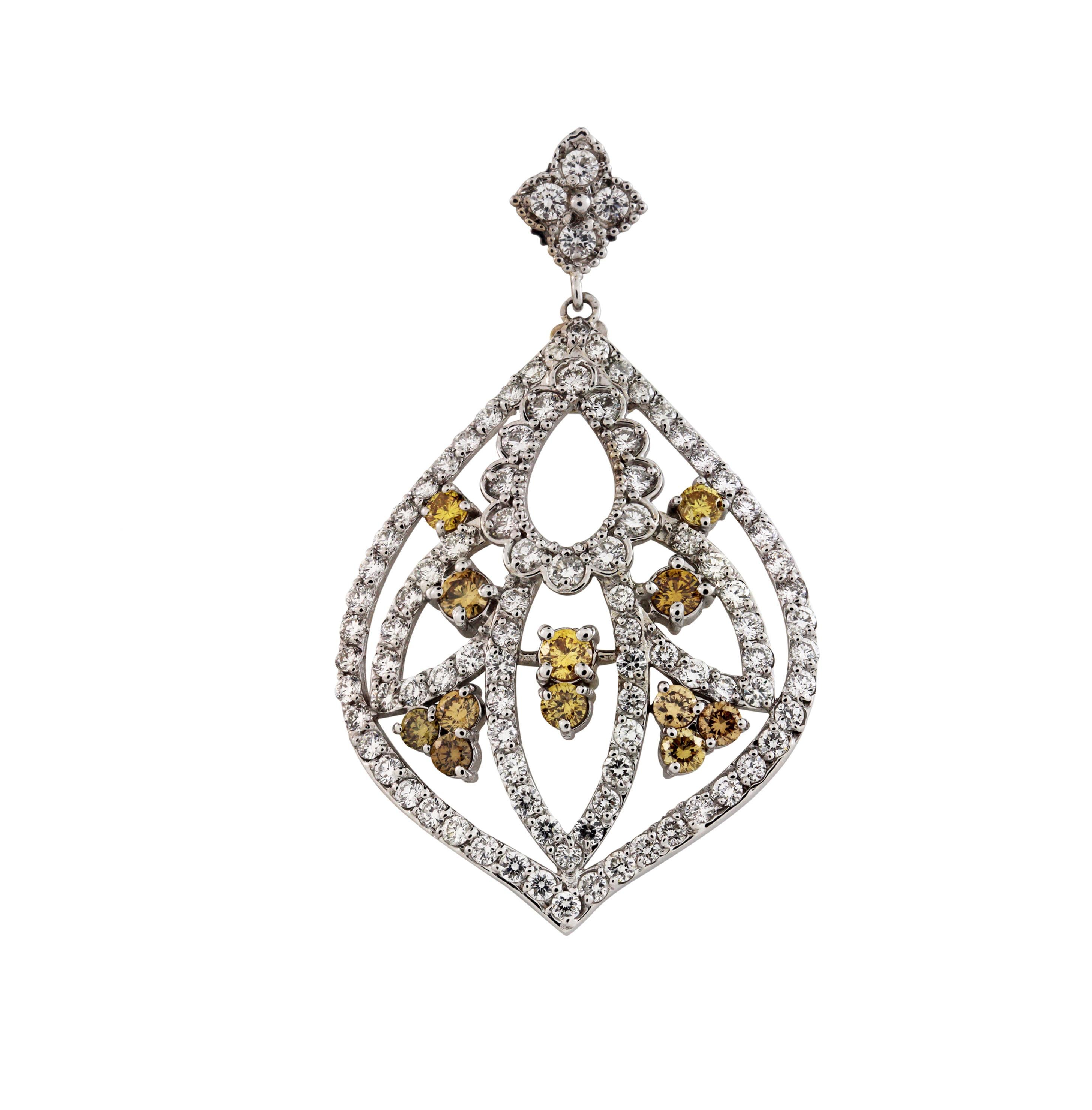IF YOU ARE REALLY INTERESTED, CONTACT US WITH ANY REASONABLE OFFER. WE WILL TRY OUR BEST TO MAKE YOU HAPPY!

18K White Gold Yellow and White Diamond Chandelier Earrings by Stambolian

6.37 carat G color, VS clarity white diamonds

2.47 carat Canary