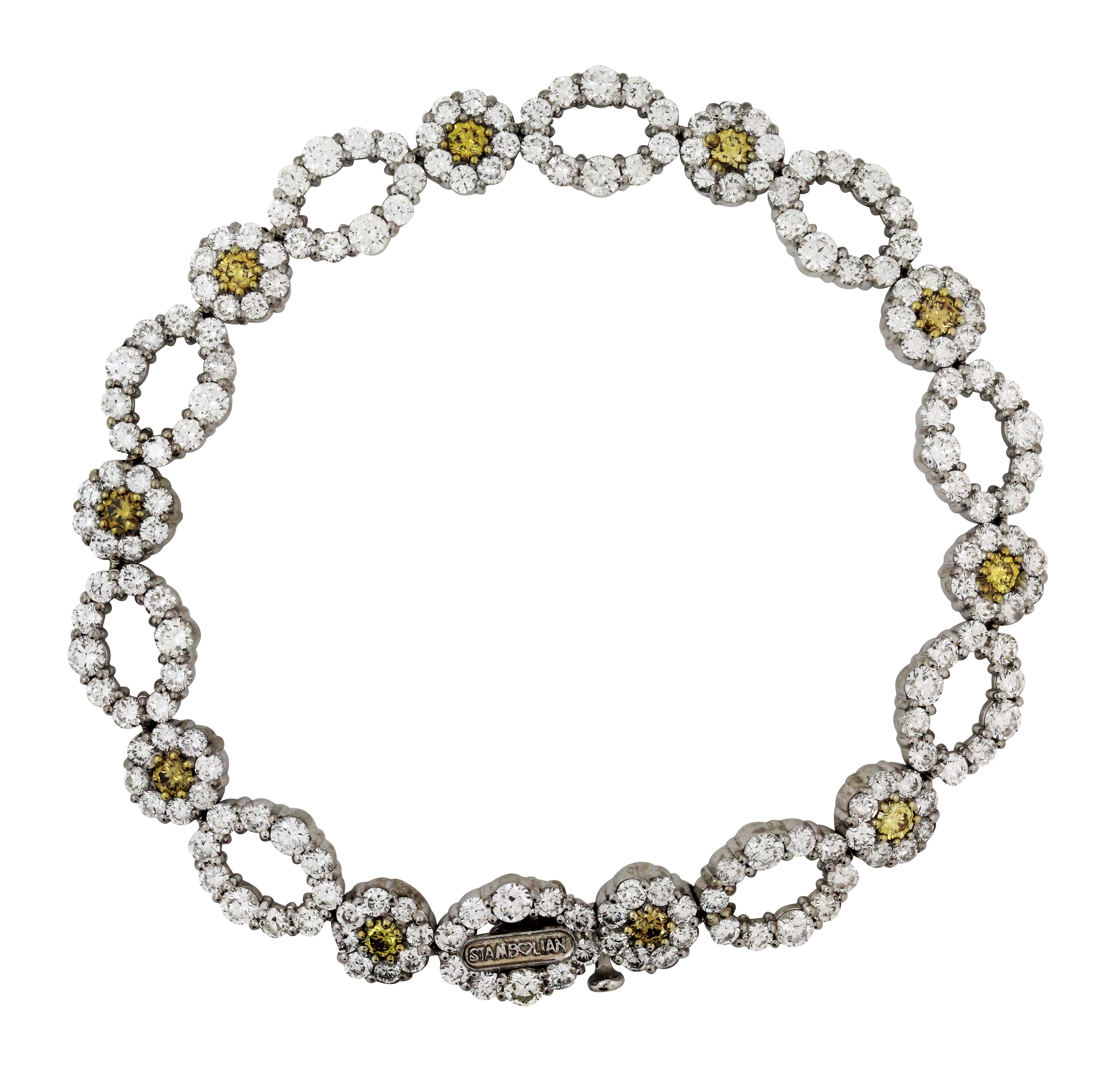 18K White Gold Link Bracelet with White and Yellow Diamonds by Stambolian 

Bracelet has 7.98 carat G color, VS clarity white diamonds
1.00 carat Yellow Diamonds

10 Yellow diamonds make up this bracelet with the rest being white diamonds

Bracelet