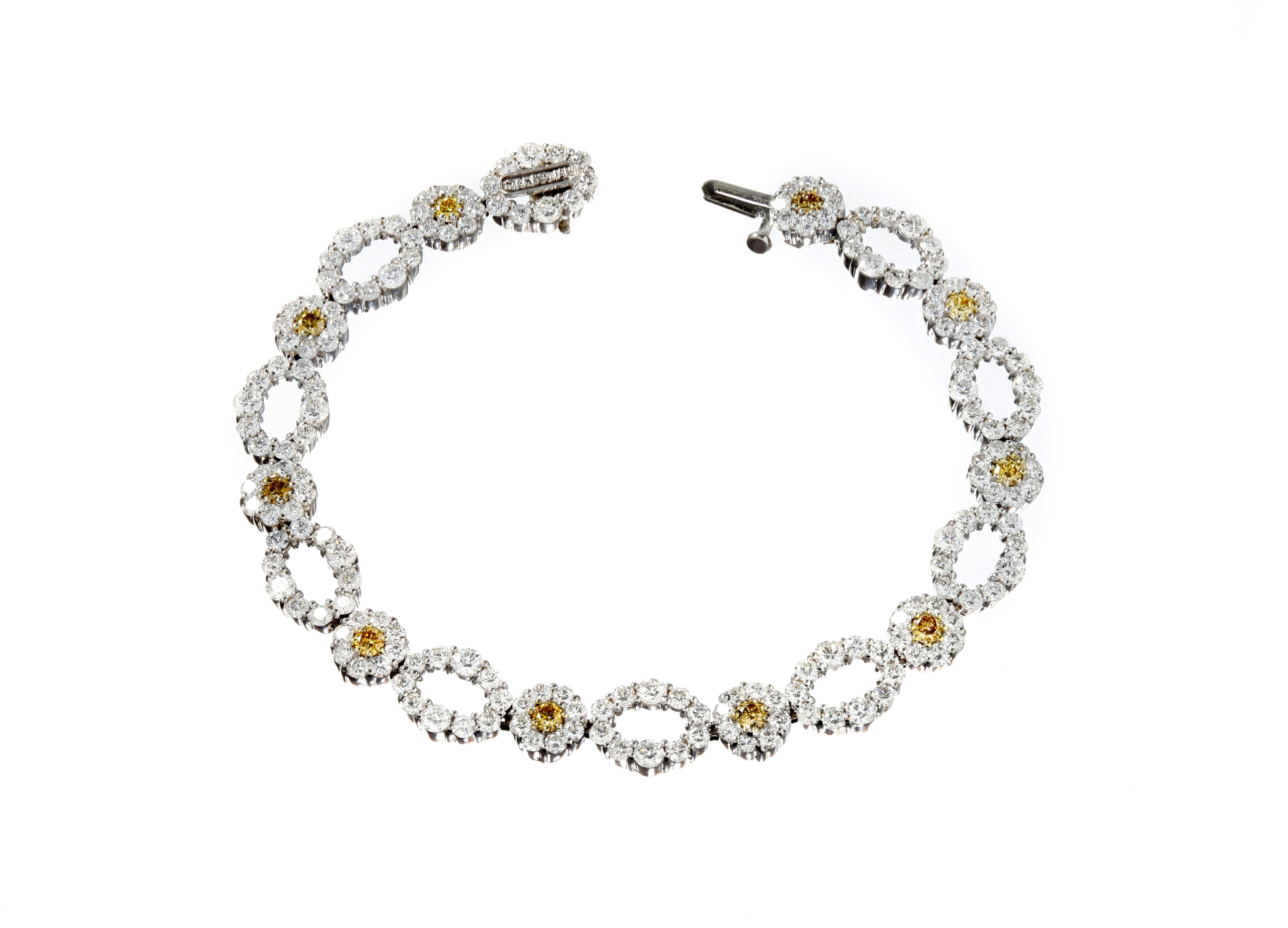 18K White Gold Link Bracelet with White and Yellow Diamonds by Stambolian 

Bracelet has 7.98 carat G color, VS clarity white diamonds
1.00 carat Yellow Diamonds

10 Yellow diamonds make up this bracelet with the rest being white diamonds

Bracelet