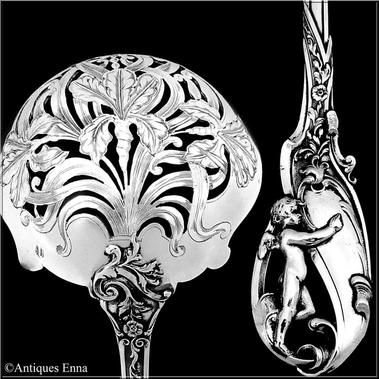 Masterpiece by Canaux, impossible to find, extremely rare piece in sterling silver. An exceptional piece from the point of view of its design. No monograms.

With circular pierced bowl, the stem and handle have ribbons, foliage and flower