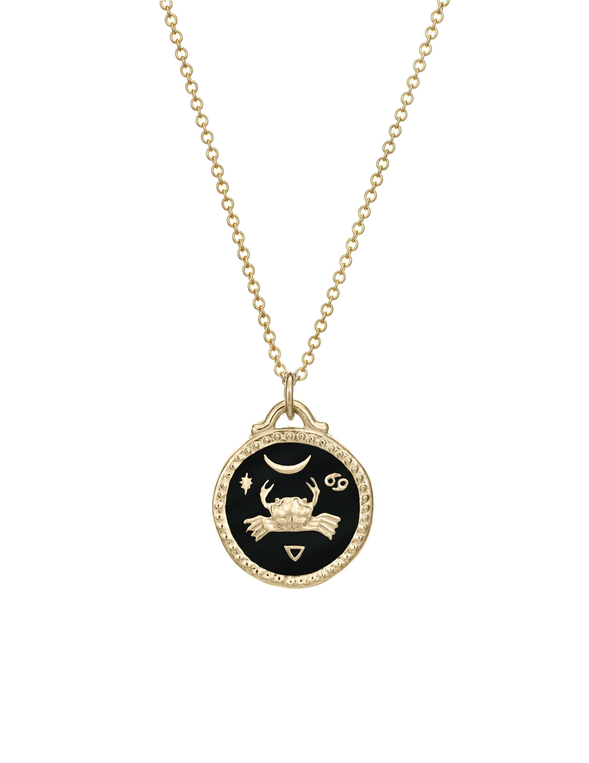 Part of our new Zodiac collection. The Cancer Pendant features a crab on one side and the Cancer symbol on the other. Designs are meticulously hand-carved into 14k gold and finished with enamel. This pendant is customizable and available in four