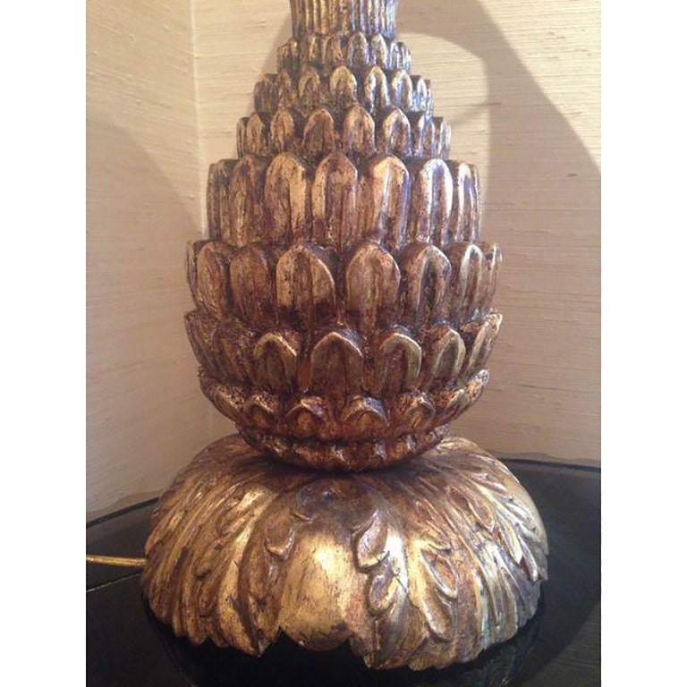 Candace Barnes hand carved freeform stepped pineapple lamp with bouquet top on Acanthus leaf base. Finished in champagne leaf with handmade silk trimmed shade and hand carved floral finial. 


