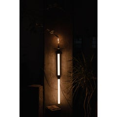 Candela Wall Sconce in Blackened Steel with Candle by Nuumbra