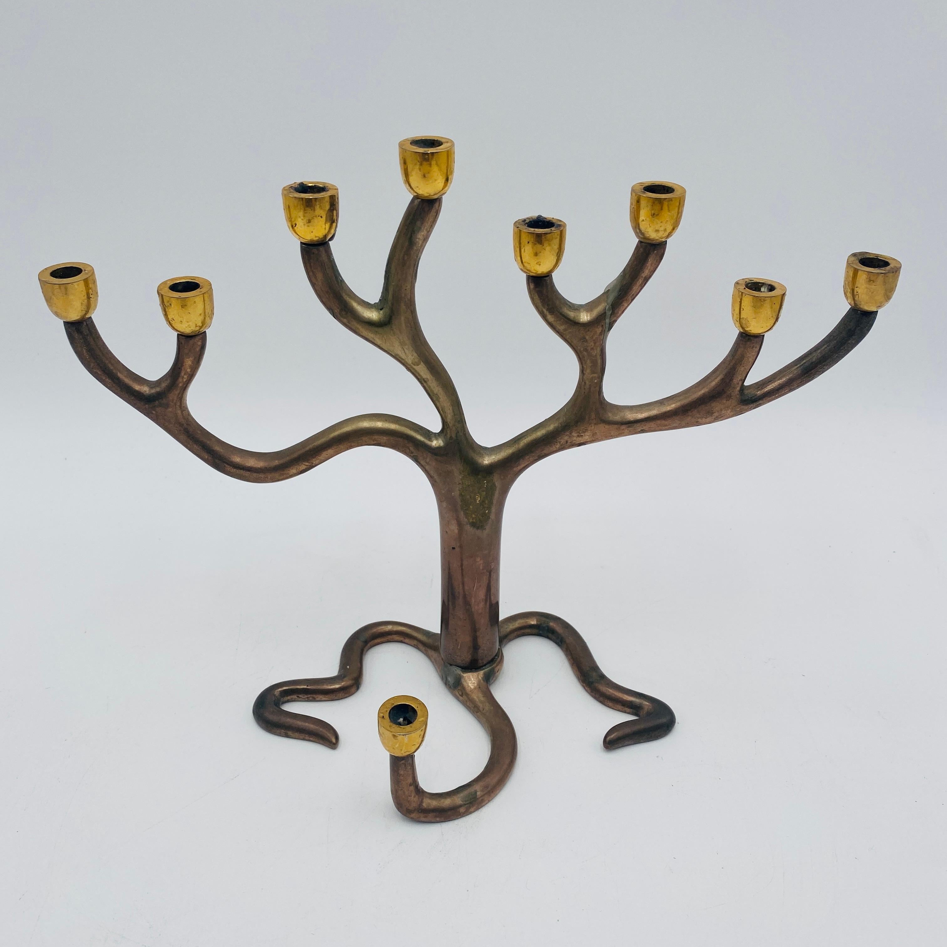Mixed metal Jewish themed candelabra, designed by Sandra Kravitz presented by the Jacob Rosenthal Collection. The bottom is stamped Rosenthal and Sandra Kravitz.