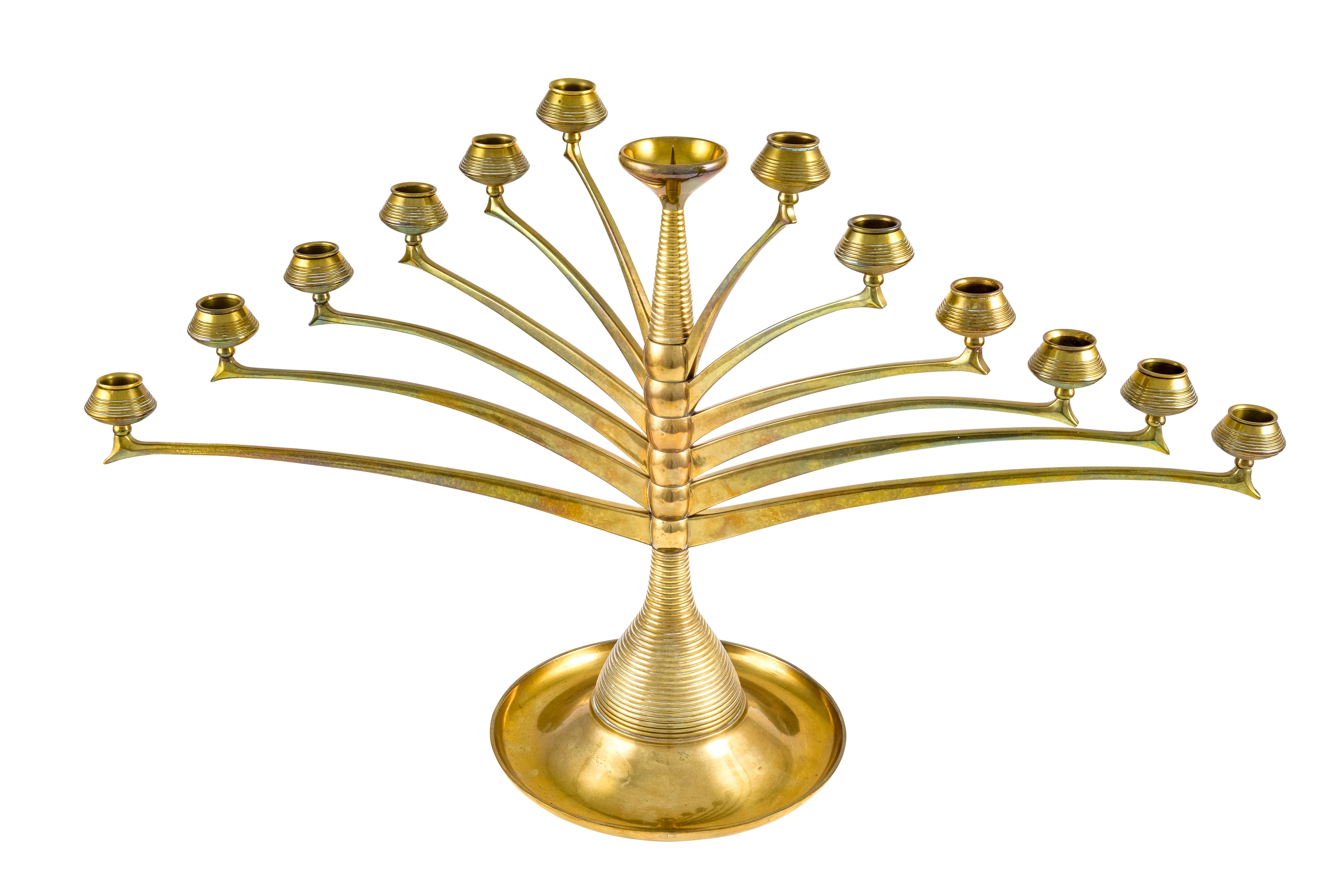Polished brass candelabras German Jugendstil designed by Bruno Paul executed by K.M. Seifert & Co. in Dresden, circa 1901

The architect Bruno Paul designed this iconic candlestick with the model number 58 in 1901. At that time, the versatile