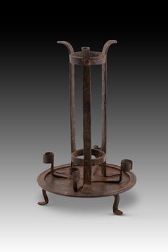 Candelabra. Wrought iron. Spanish school, 19th century.