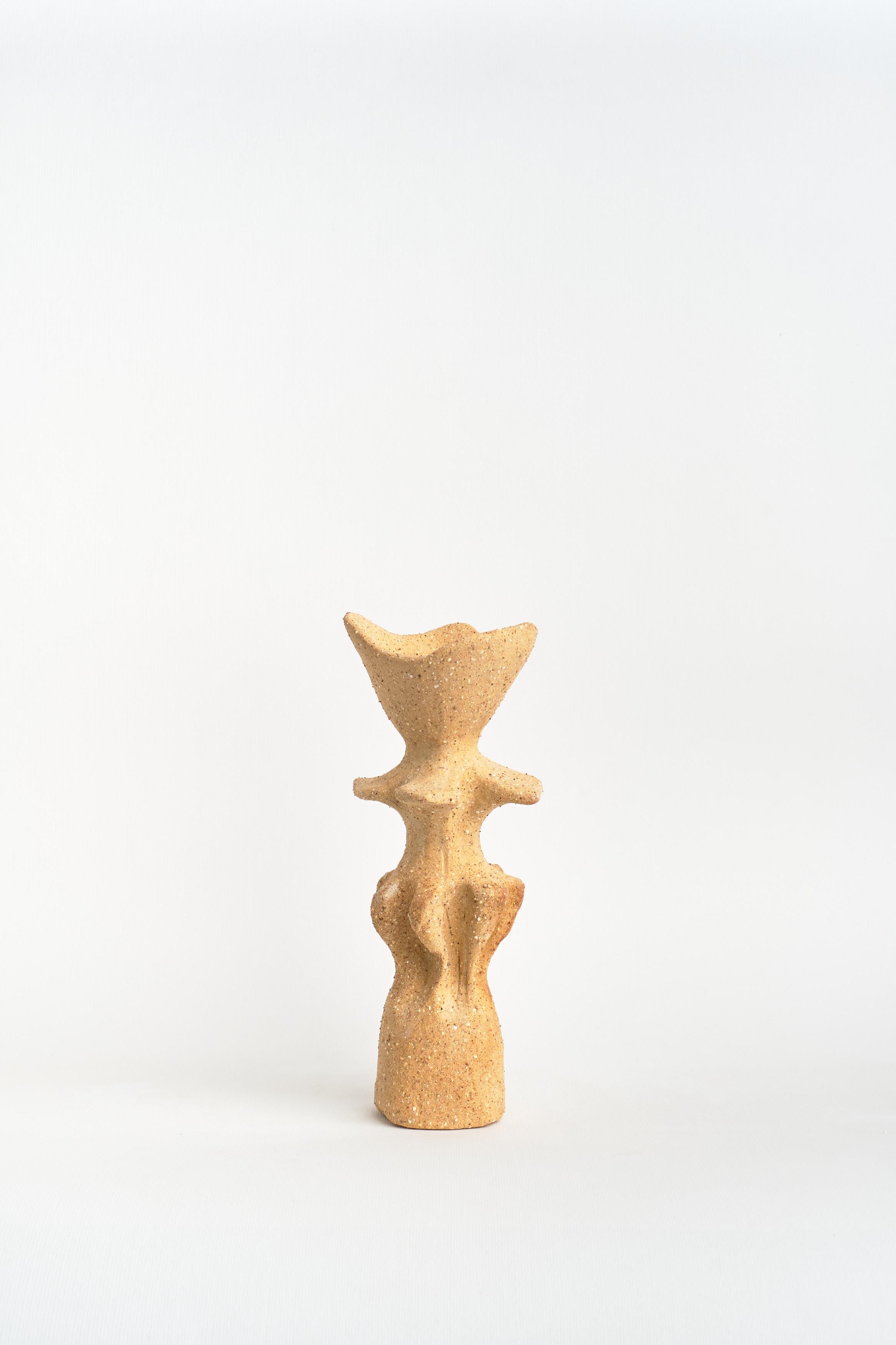 Candelabro 3 Candleholder by Camila Apaez
Unique
Materials: Stoneware, Red Clay
Dimensions: ⌀ 7 x H 20 cm

Ila Ceramica emerged from a process of inner inquiry where ceramics became a space for presence, silence, touch and patience. Camila
