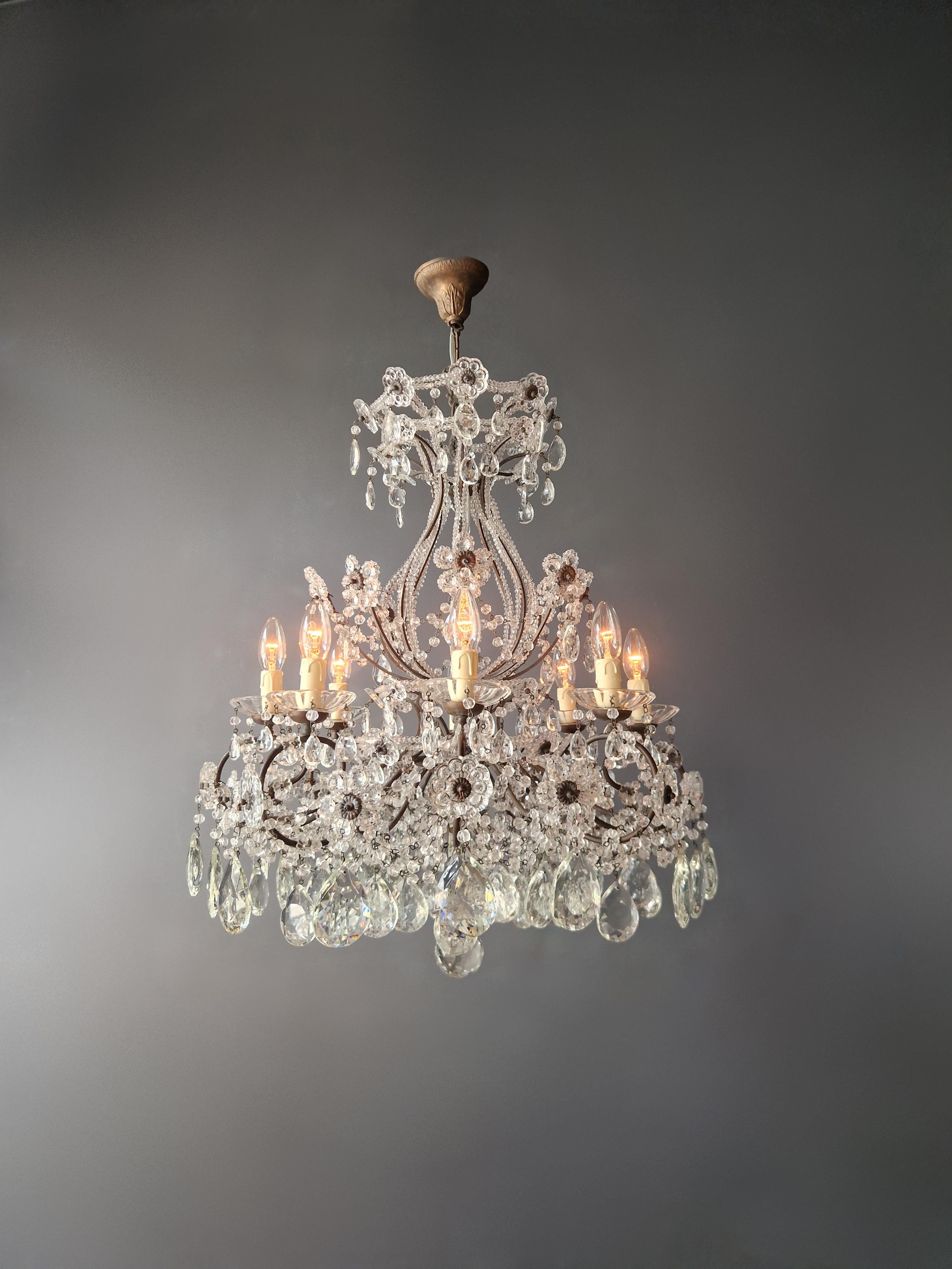 Elegant Candélabre ancien en cristal - Une merveille d'artisanat Art Nouveau

Voici un lustre candélabre vraiment exceptionnel qui capture l'essence de l'opulence et de la grâce de l'ère Art nouveau. Cette pièce exquise a fait l'objet d'une