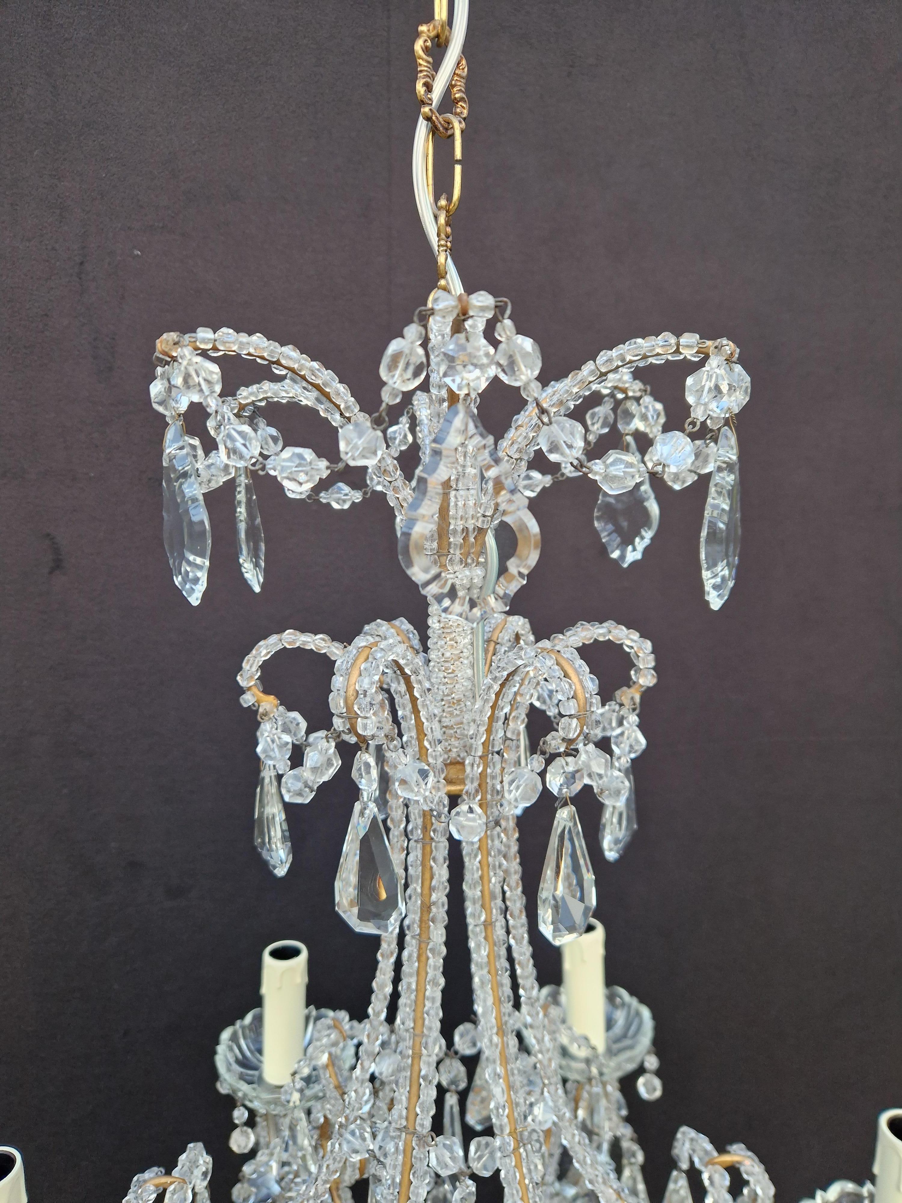 Introducing our exquisite Candelabrum Crystal Antique Chandelier, a masterpiece that embodies the elegance of Art Nouveau.

Measuring a total height of 90 cm (height without chain 65 cm) and a diameter of 51 cm, this chandelier exudes timeless