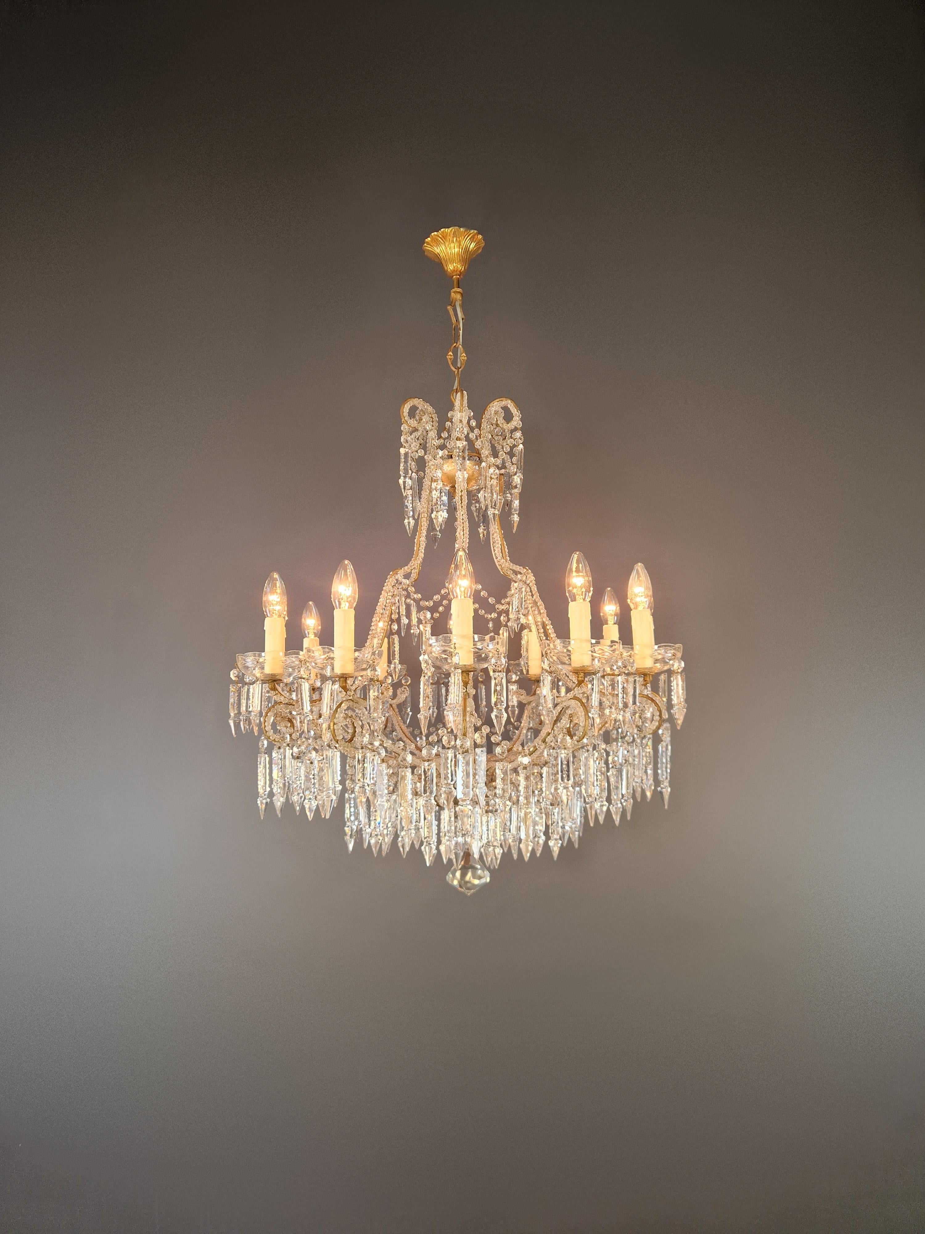 Introducing our exquisite Candelabrum Crystal Antique Chandelier, a masterpiece that embodies the elegance of Art Nouveau.

Measuring a total height of 110 cm (height without chain 80 cm) and a diameter of 77 cm, this chandelier exudes timeless