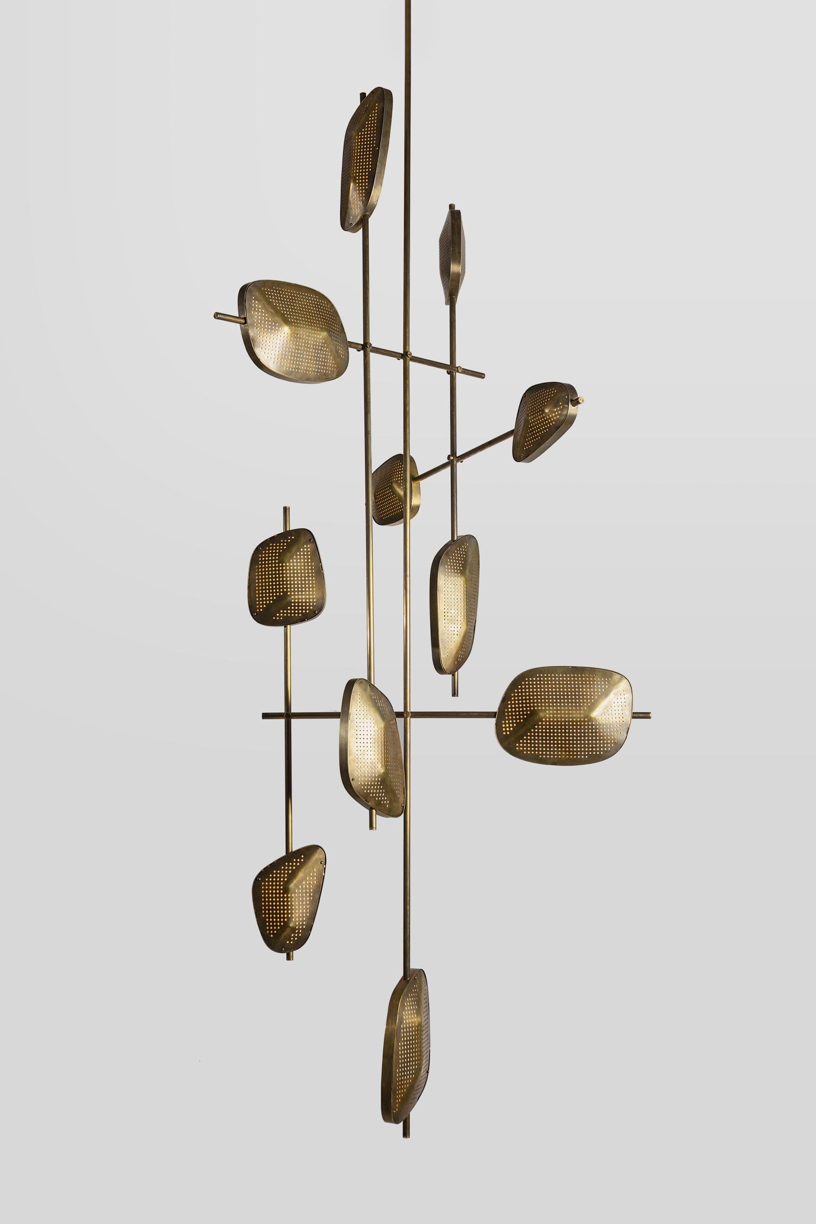 Candelera 03 hanging lamp by Federico Stefanovich
Dimensions: Ø90 x H 190 cm
Material: Structure and volumes made of brass with an aged and sealed finish. Polypropylene light diffusers. Dimmable LED strips.

Federico Stefanovich presents himself