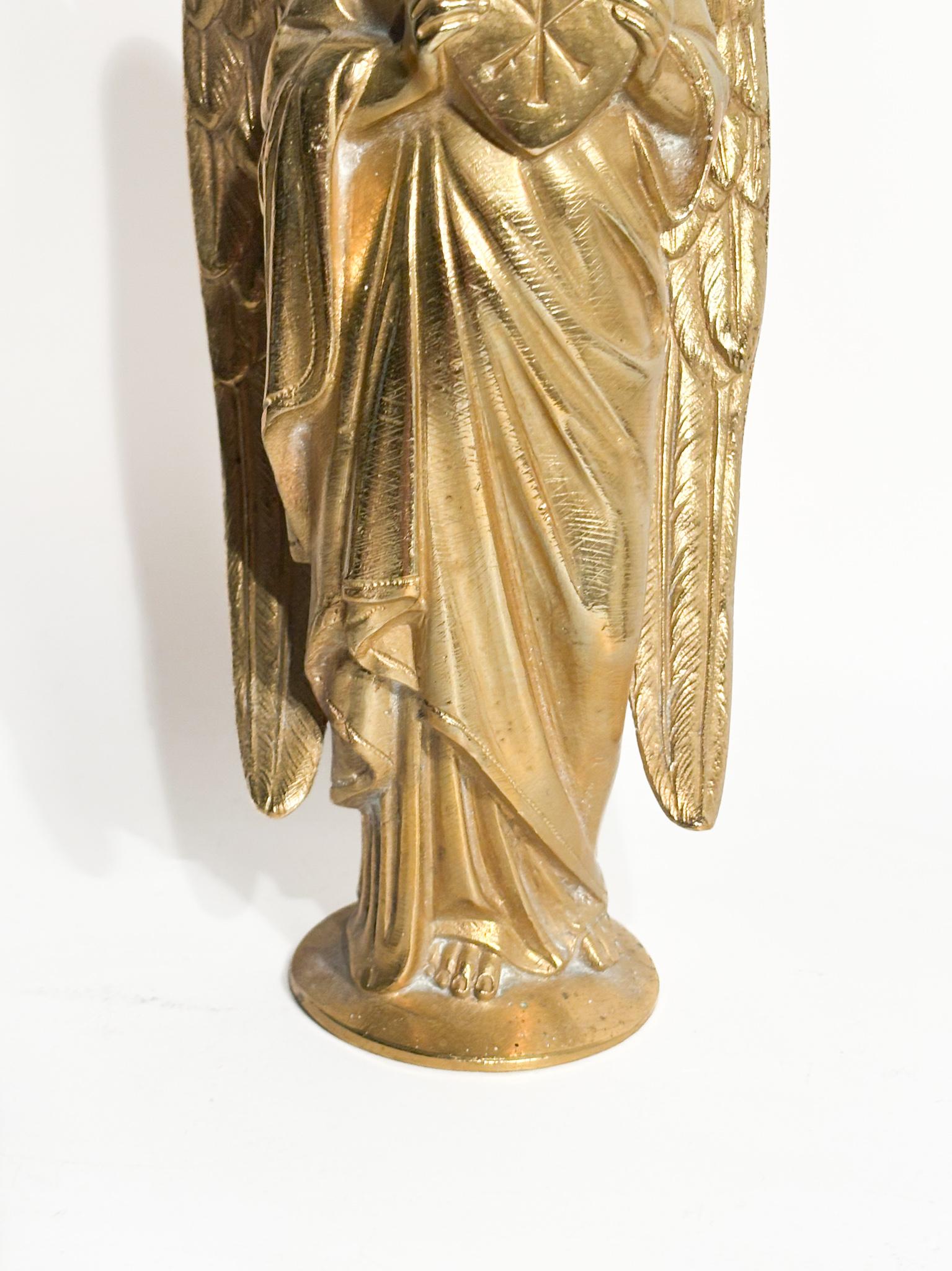 Candelero individual con ángel en bronce dorado Francia Siglo XX French en venta