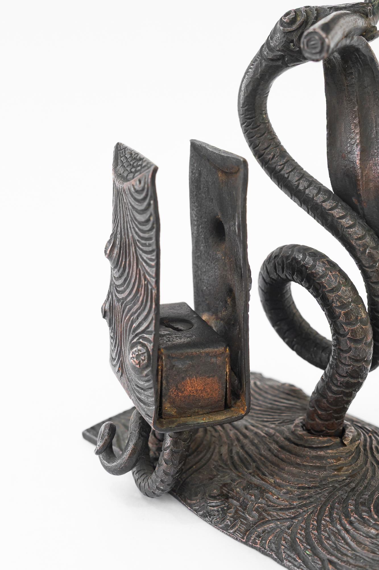 Jugendstil Wrought iron candle holder with snake and flower and match holder For Sale