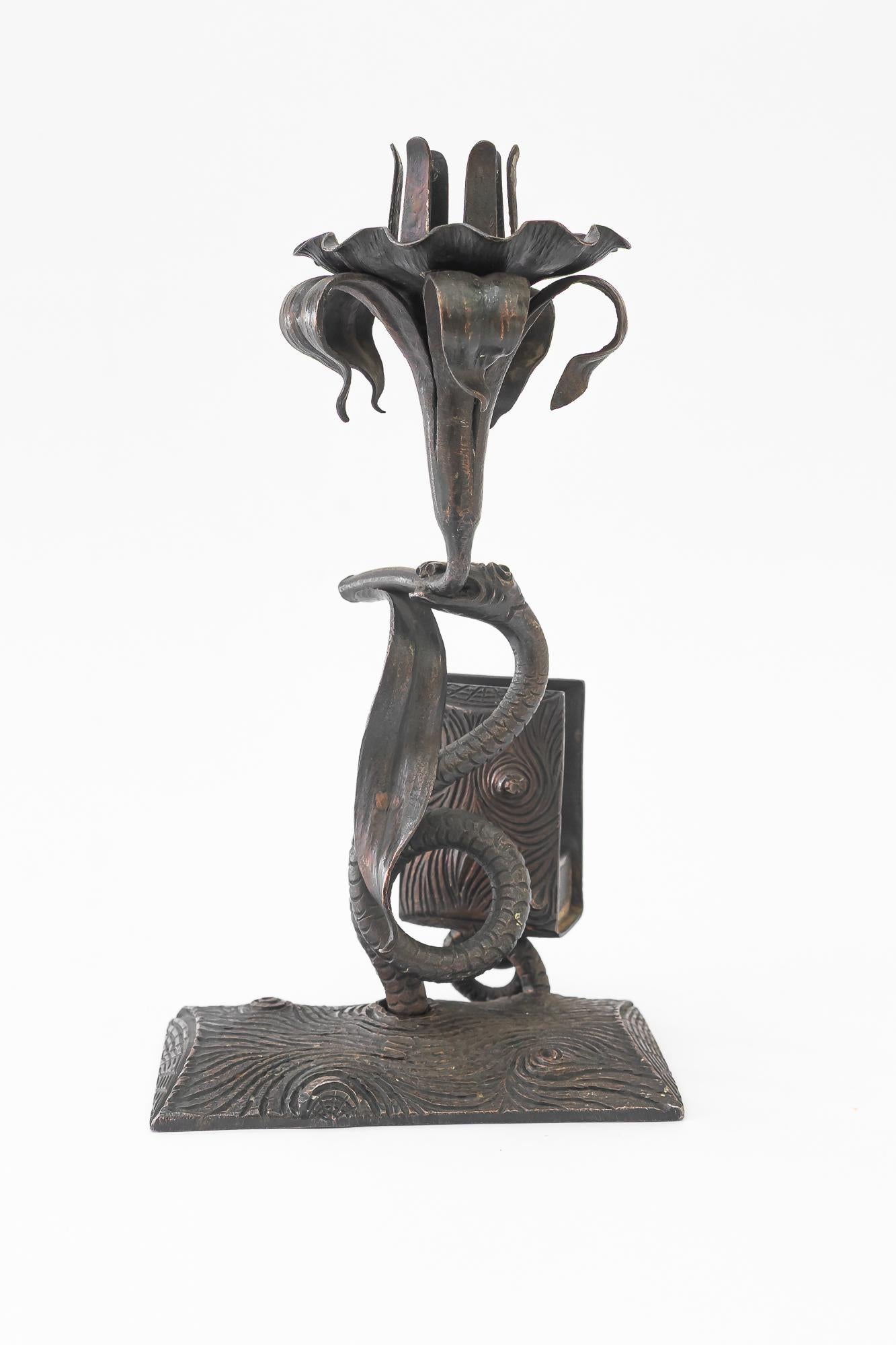 Early 20th Century Wrought iron candle holder with snake and flower and match holder For Sale