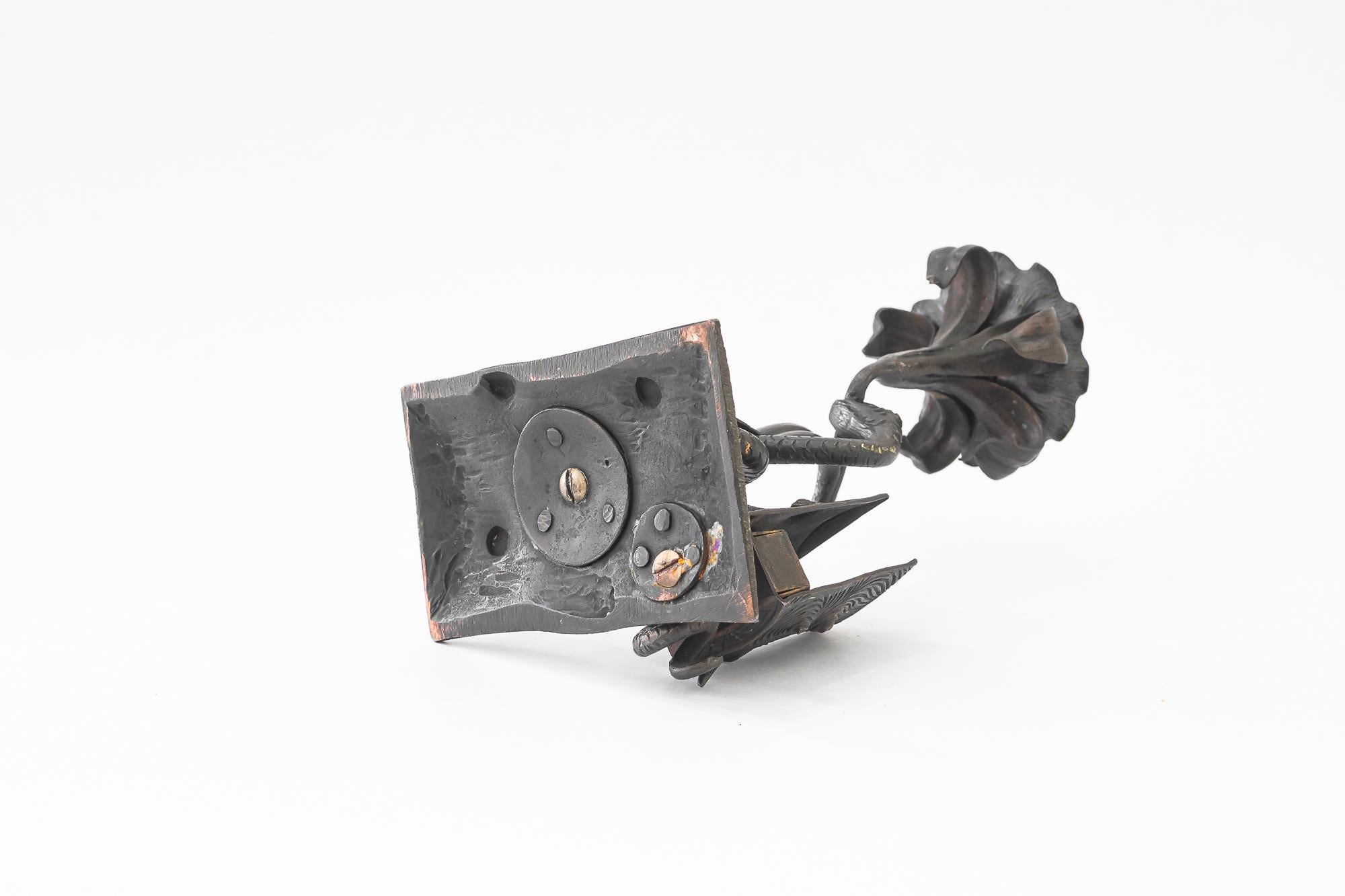Iron Wrought iron candle holder with snake and flower and match holder For Sale