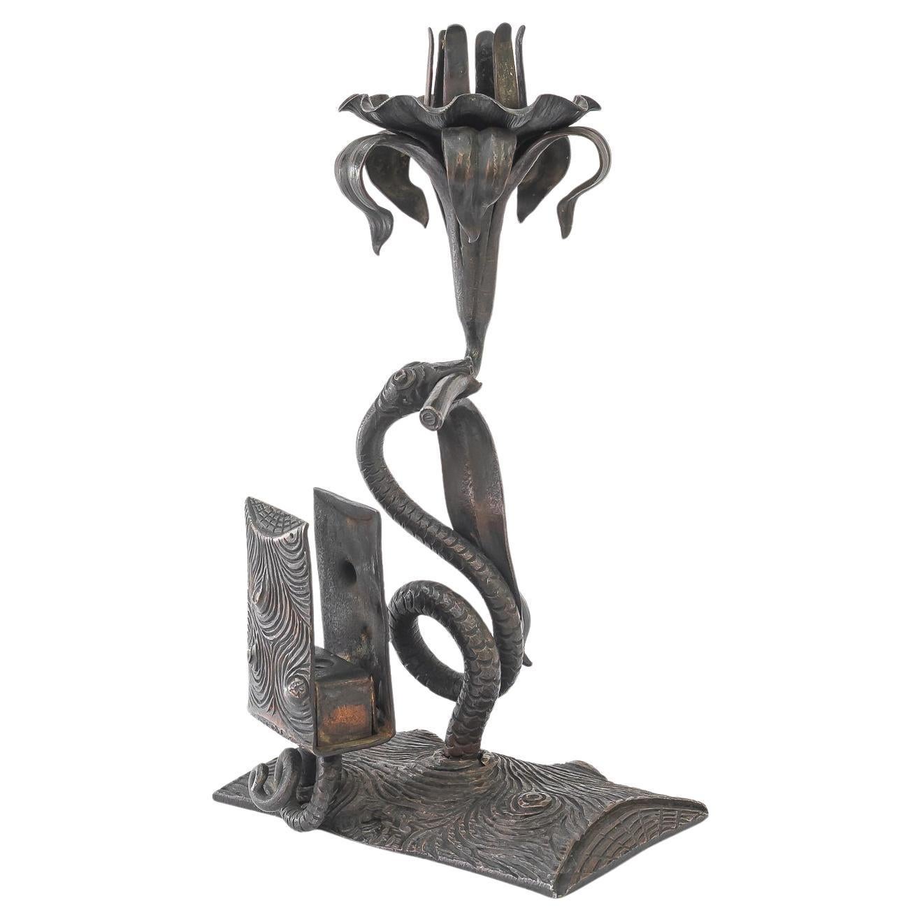 Wrought iron candle holder with snake and flower and match holder For Sale