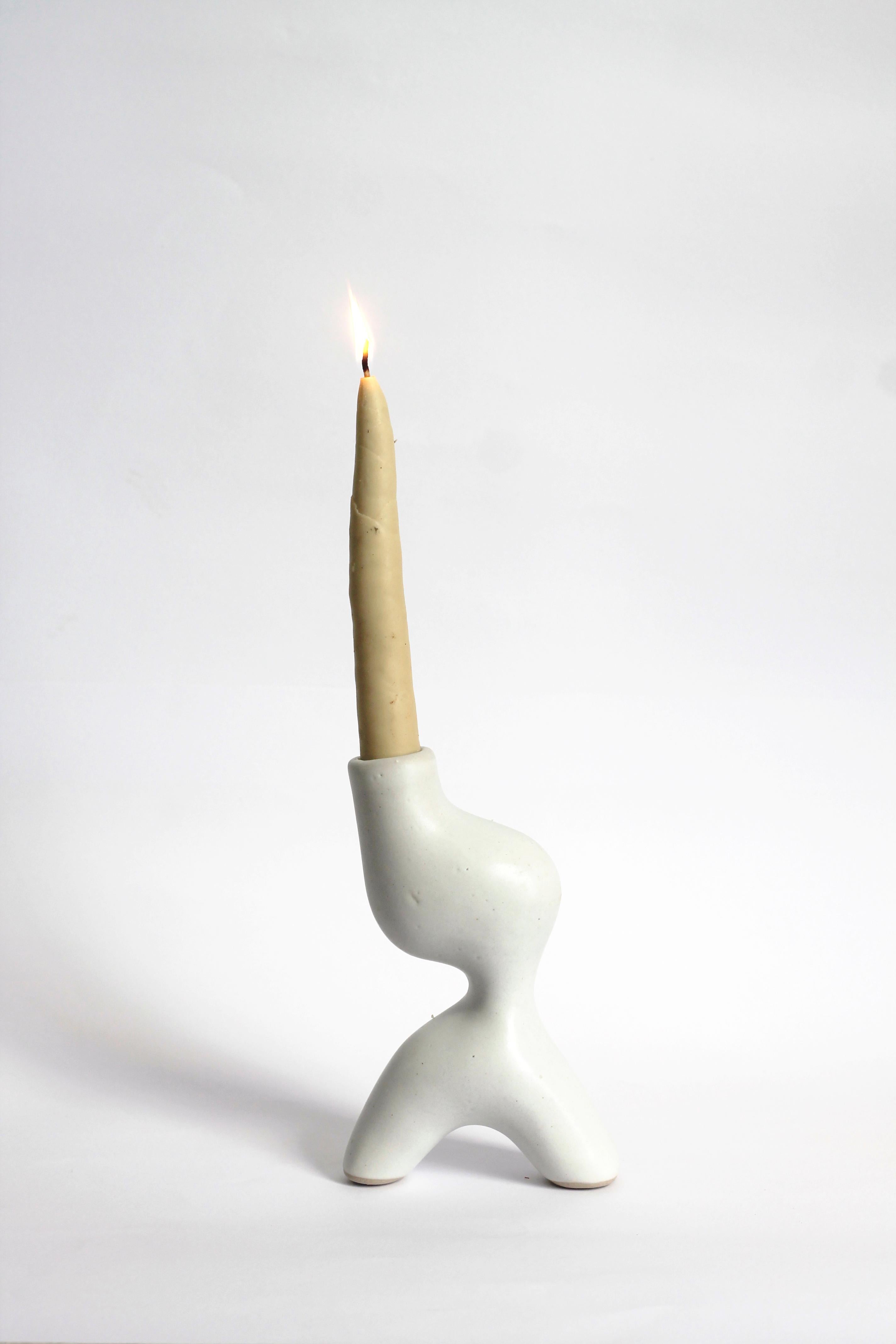 Candle Holder Candelabro by Camila Apaez.
One of a Kind.
Materials: Stoneware.
Dimensions: 11 x 7 x 16 H cm.

Ila Ceramica emerged from a process of inner inquiry where ceramics became a space for presence, silence, touch and patience. Camila