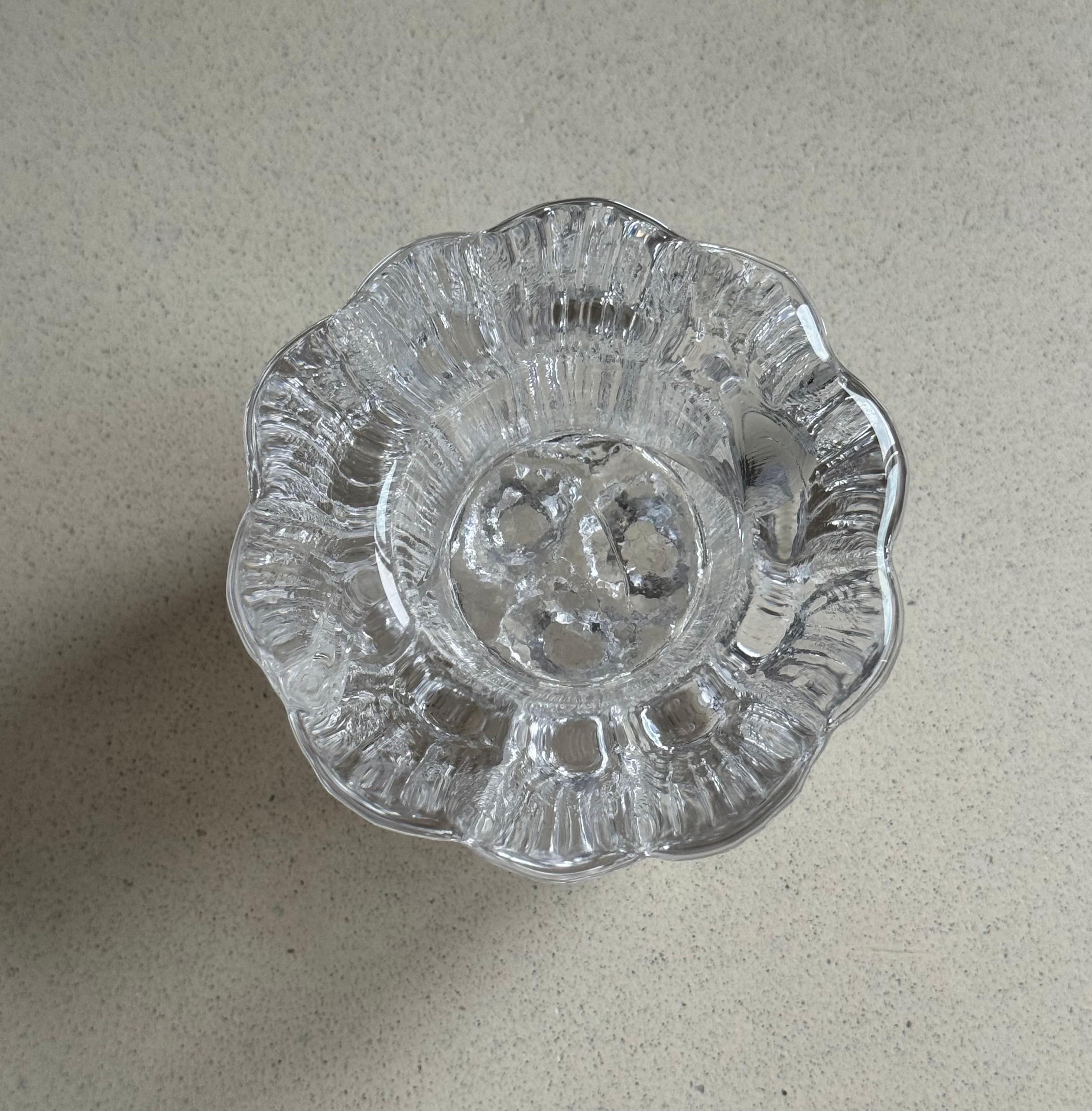 Introducing the Exclusive Glass Candle Holder Designed by Willy Johansson

Are you a collector or art enthusiast who treasures Scandinavian design heritage? We are delighted to present a stunning glass candle holder designed by the esteemed Willy