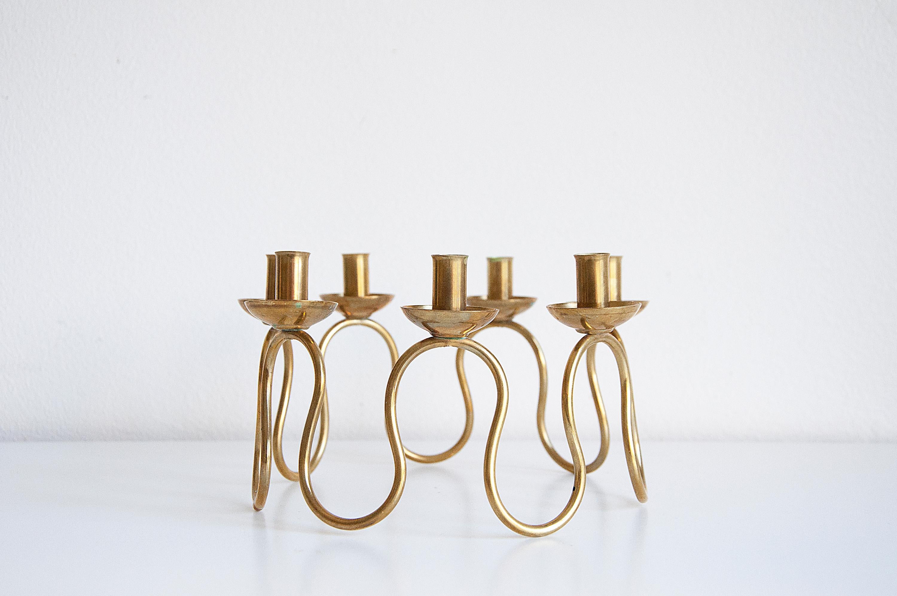 Beautiful swedish modern candleholder in brass by Lars Holmström, 1950s.
Good vintage condition, wear and patina consistent with age and use. 