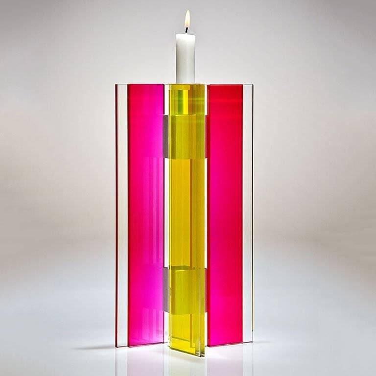 This polished glass candleholder from the Majestic series is designed by world renowned glass artist, Sidney Hutter. With 40 years of experience in the contemporary glass and Fine art world, Sidney now creates illuminated designs for the home.