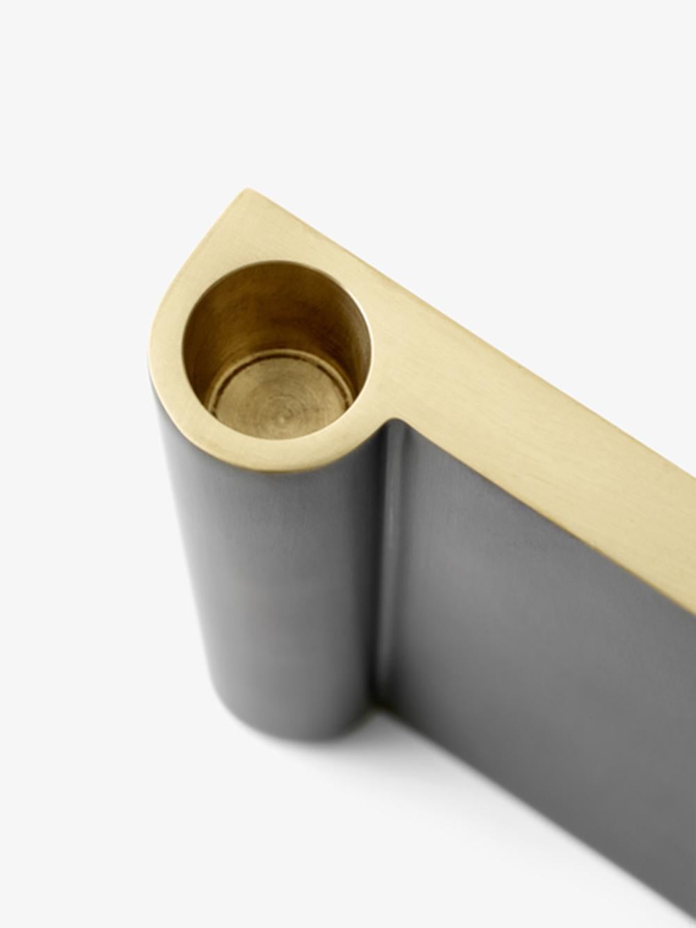 This bronzed brass candle holder is the biggest of the candle holders, within the Collect series, a curated line of beautifully crafted soft furnishings and home objects. 
Designed by Space Copenhagen, for a handsome addition to the home.
Made