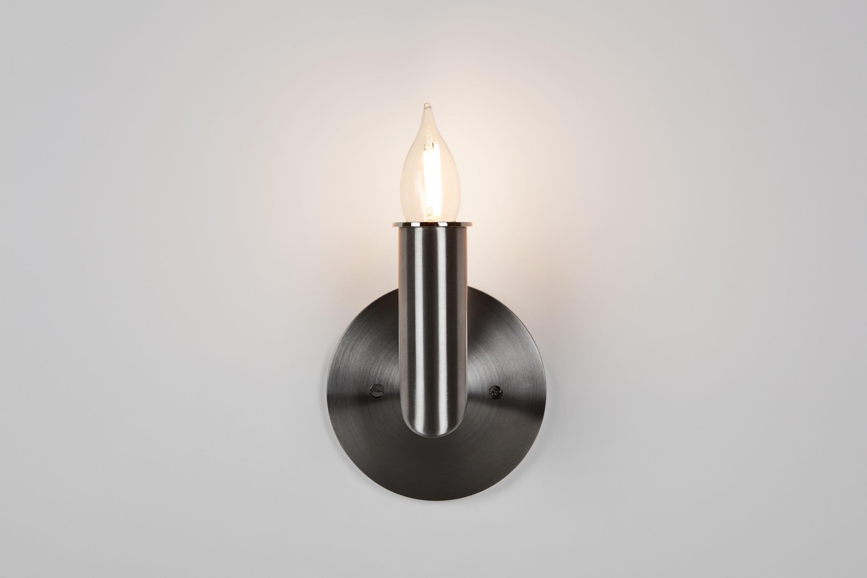 The Candle series started with the question: what type of lighting pairs well with contemporary art? What resulted is this three-pronged, 3-D emoji version of a classical candelabra. Candle’s stainless-steel body was produced in upstate New York by
