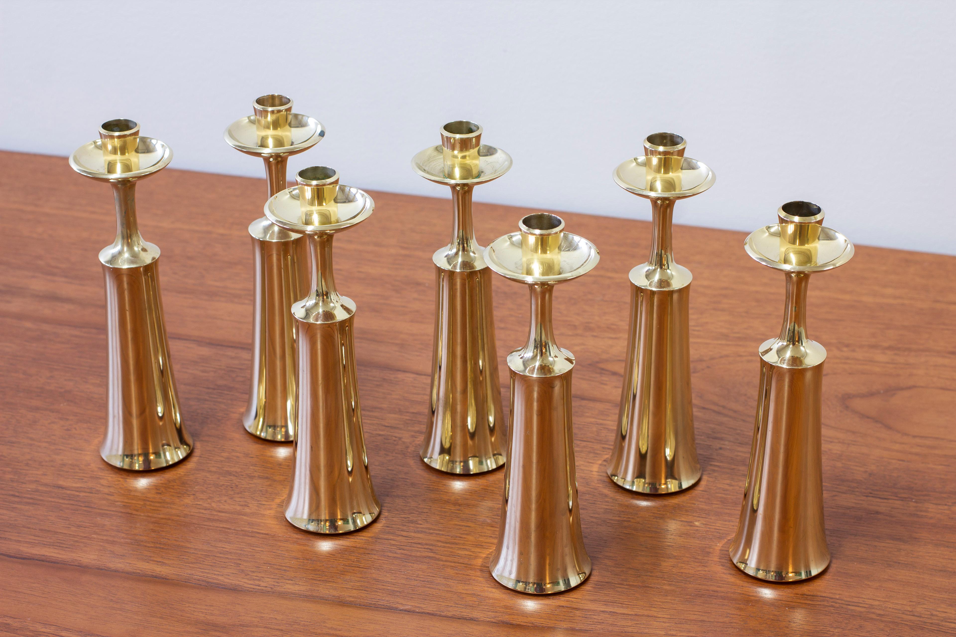 Candlesticks designed by Jens Harald Quistgaard. produced by Dansk designs in Denmark during the 1950s. Made from solid polished brass. Good vintage condition with light age related wear and patina. small dings and scratches but overall nice