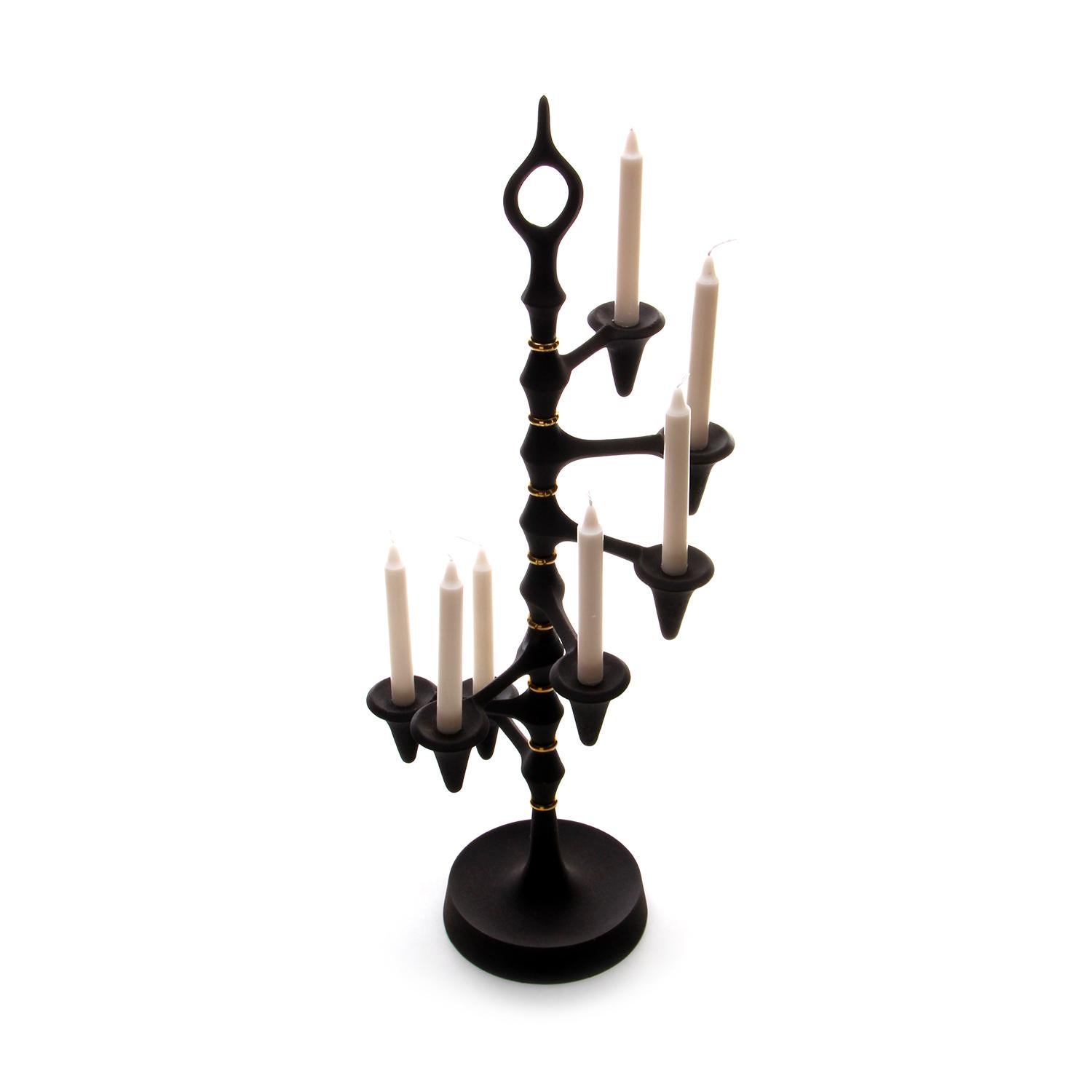 Candle tree, no. 1419 by Jens H Quistgaard for Dansk Designs in the late 1950s - Mid-Century Modern Danish cast iron candleholder with box of new white tapers included, in rare excellent vintage condition.

An elegant cast iron candelabrum,