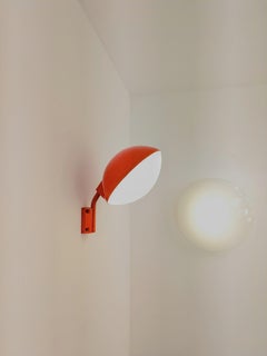 Candle vs Fontana arte red wall light
