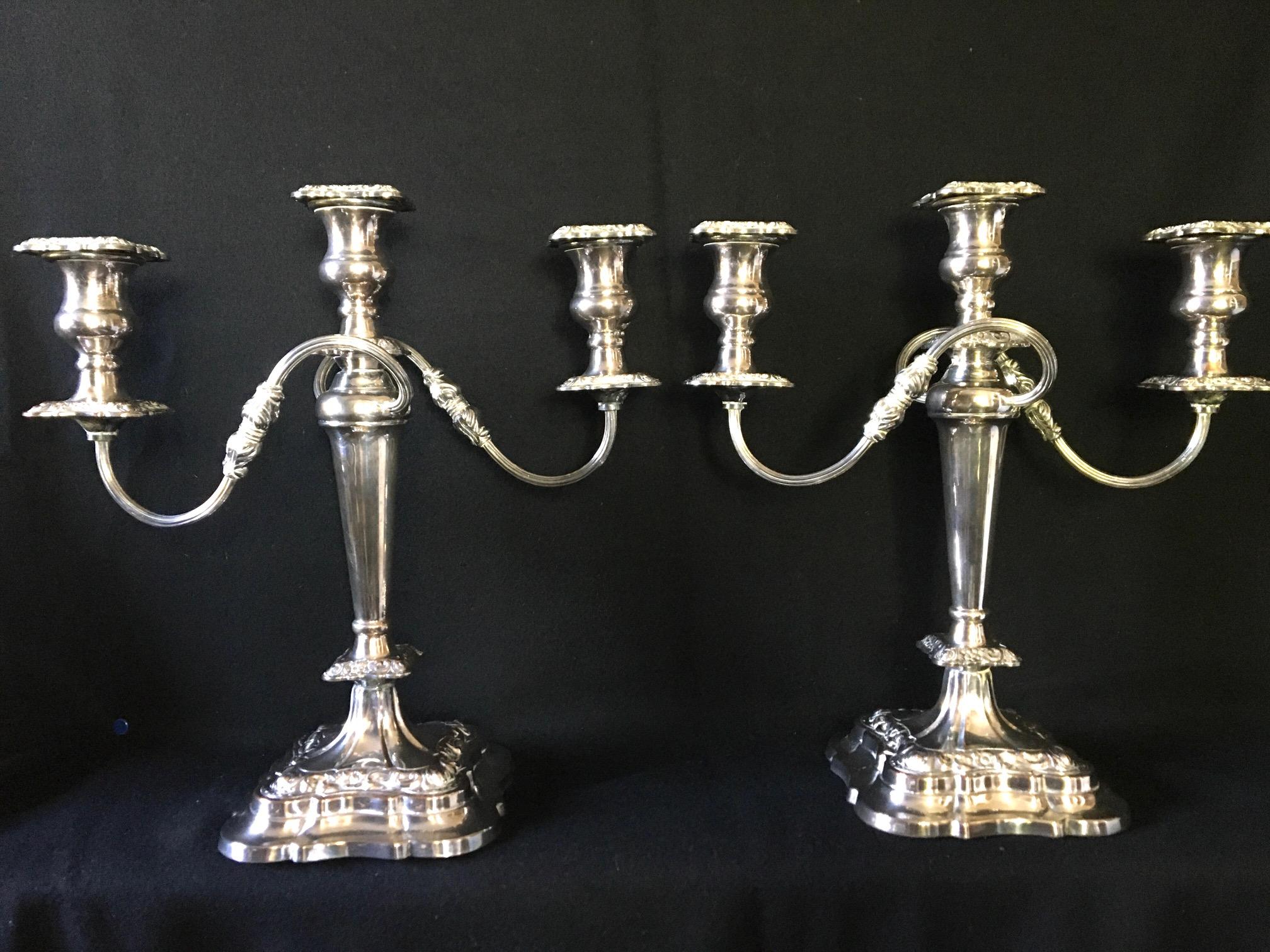 Attractive pair of Sheffield-plated candelabra. English, circa 1930
These can be used as a triple or as a single candlestick. They are both in good condition and have a small amount
of rubbing around the bases, giving a coppery appearance.