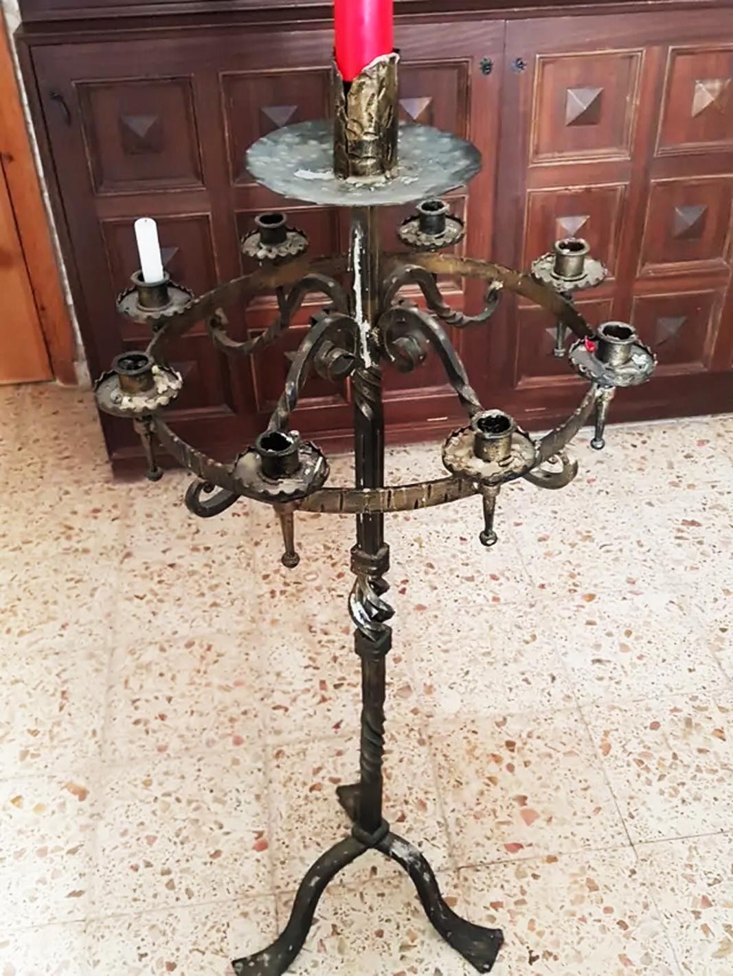 Late 19th Century or Early 20th Century

Votive candlestick, for 9 candles, made in wrought iron 
Golden candlestick candleholder or centerpiece to place on floor candle holder.



   

